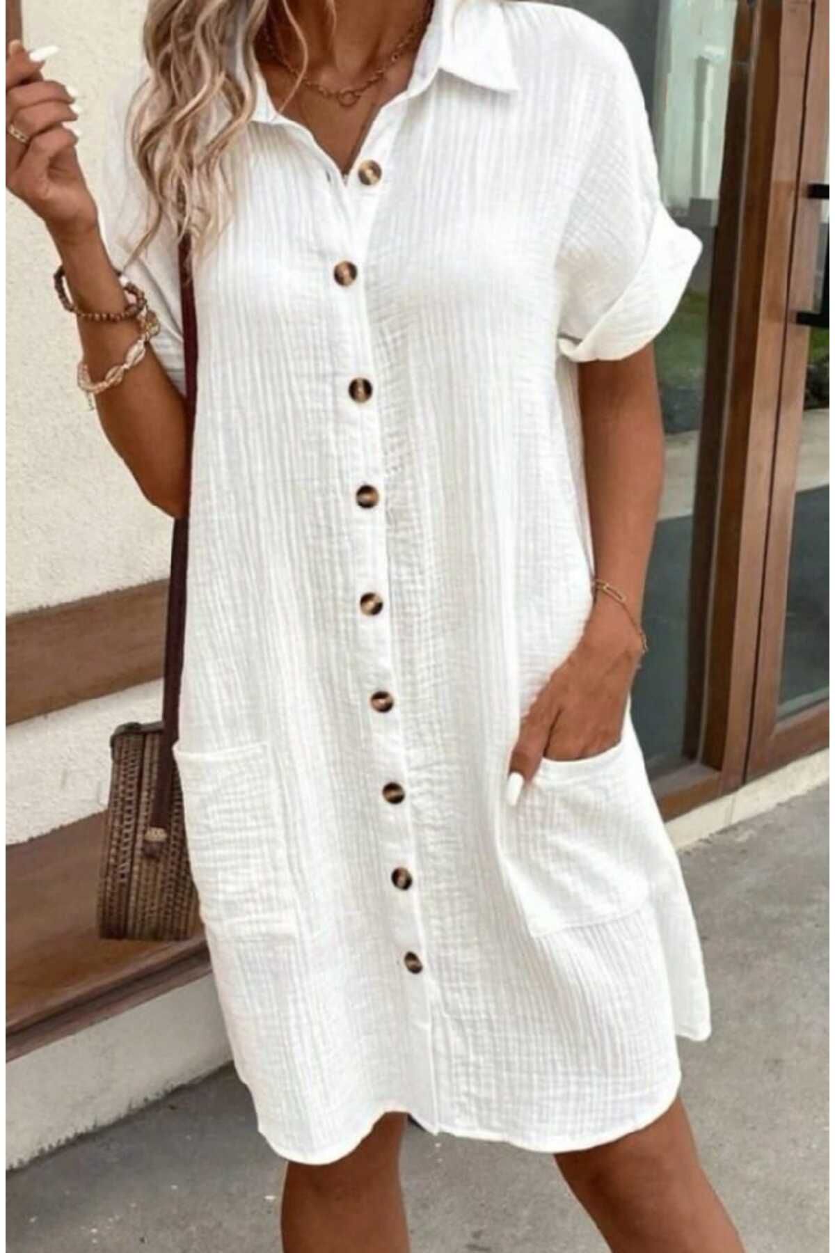 Butik KISA KOLLU CEP DETAYLI BÜRÜMCÜK GÖMLEK ELBİSE
