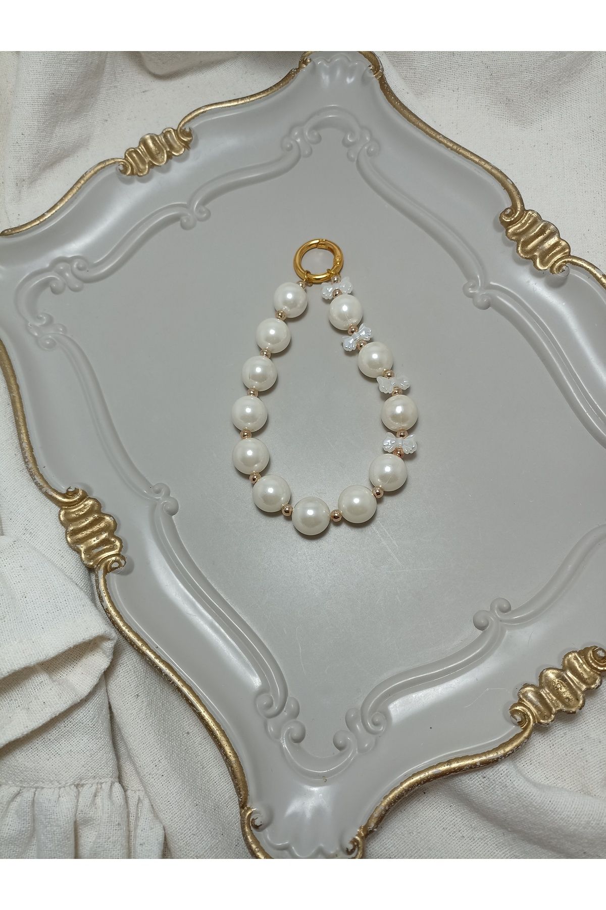ida design store büyük boy inci ile inci fiyonk ve gold detaylı çanta ve telefon charmı