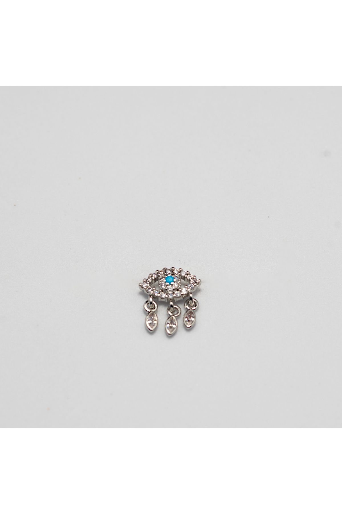 Piercing by Sever TURKUAZ GÖZ SALLANTILI NAZAR ÇELİK PIERCING… GÜMÜŞ RENKLİ ve ŞEFFAF TAŞLI (TARGUS HELIX CONCH FLAT)
