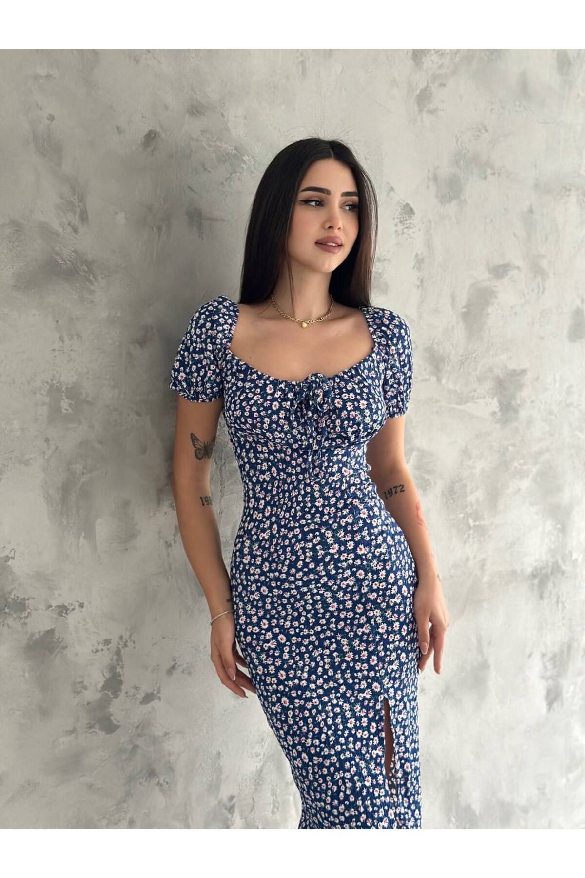 Butik Merline kadın siyah çıtır bürümcük çiçekli yıtmaçlı günlük elbise