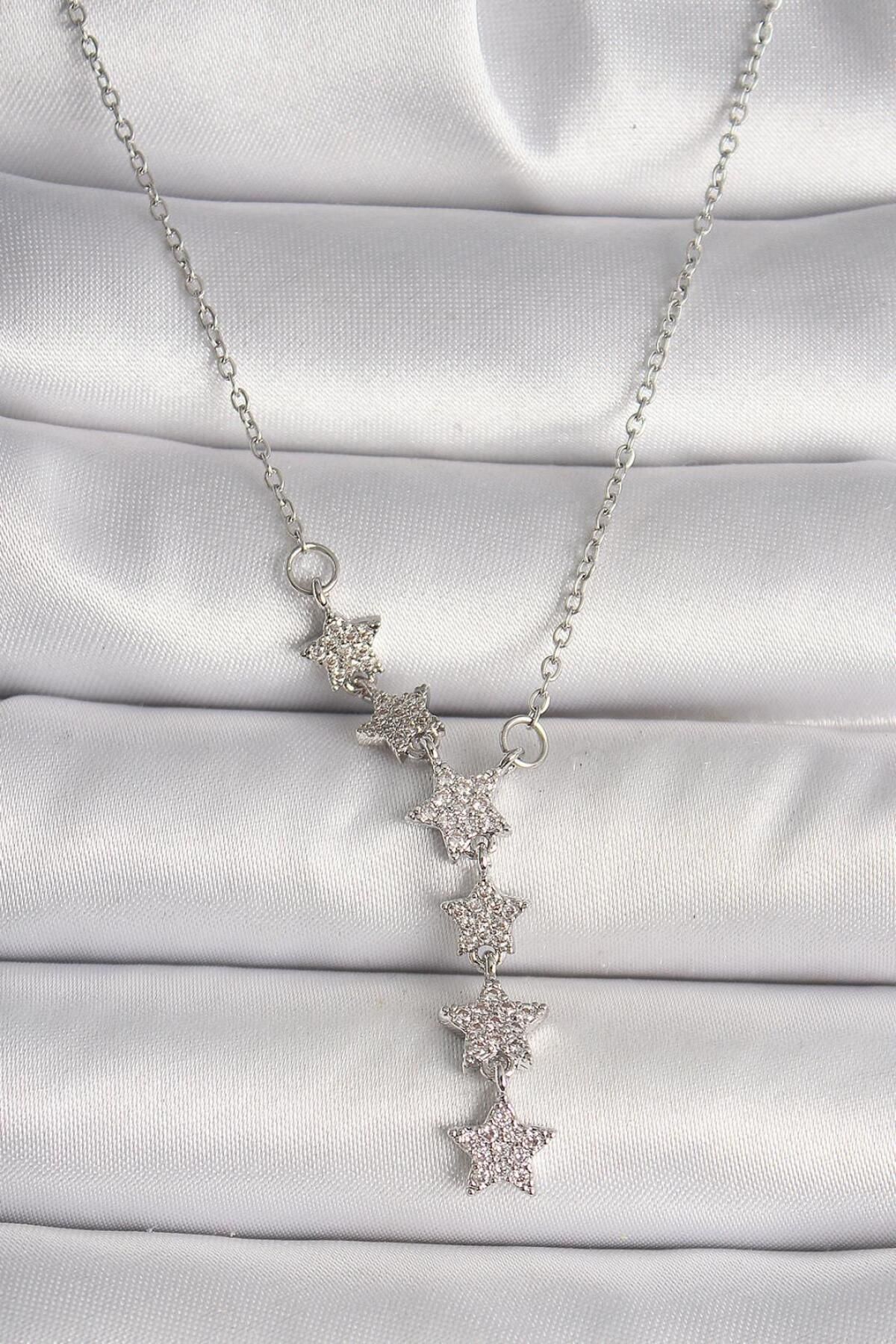 Grace Design Yıldız patlaması gümüş renk kadın kolye
