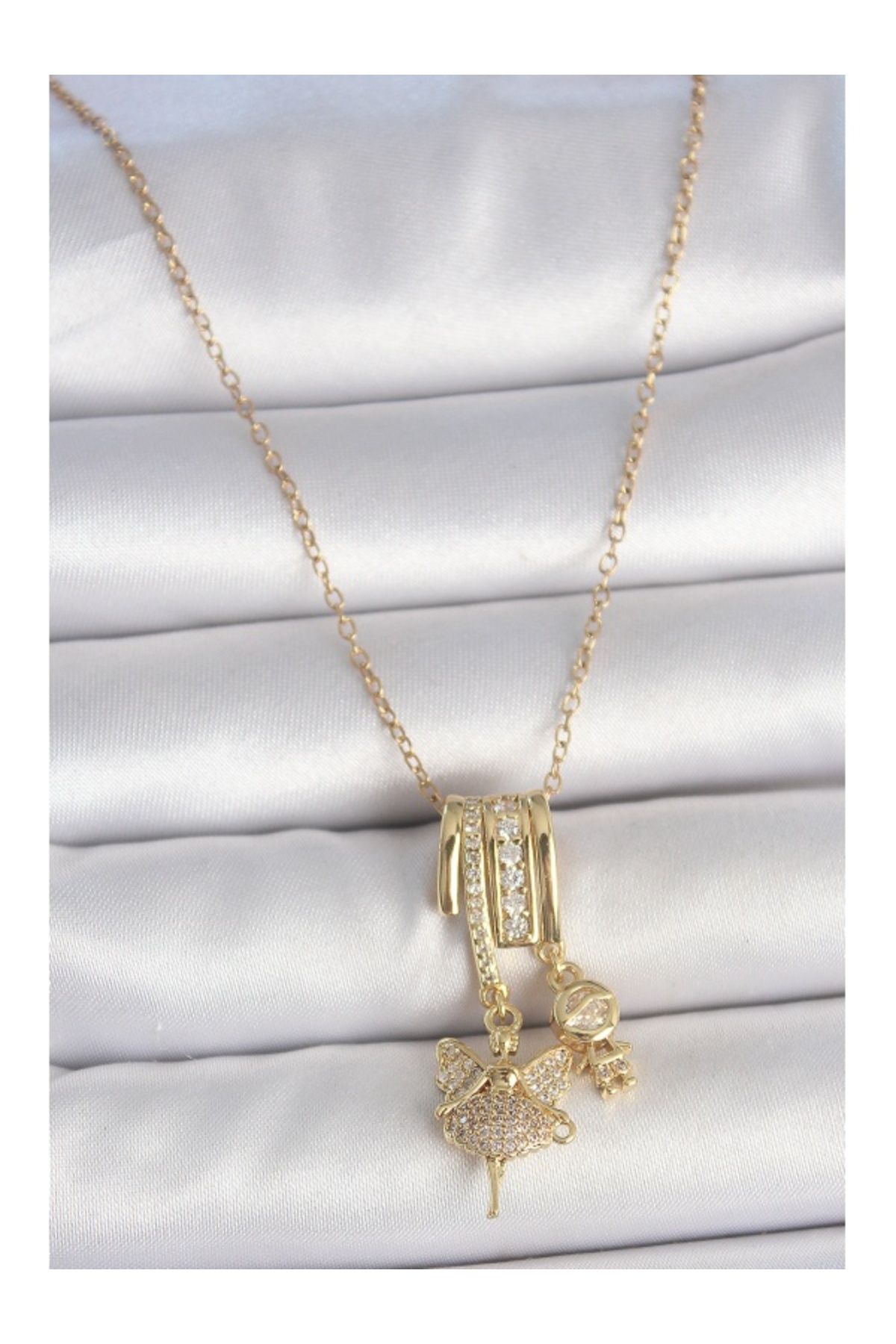 Clariss 316L Çelik Gold Renk Zirkon Taşlı Sallantı Melek Figür Charm Kadın Kolye
