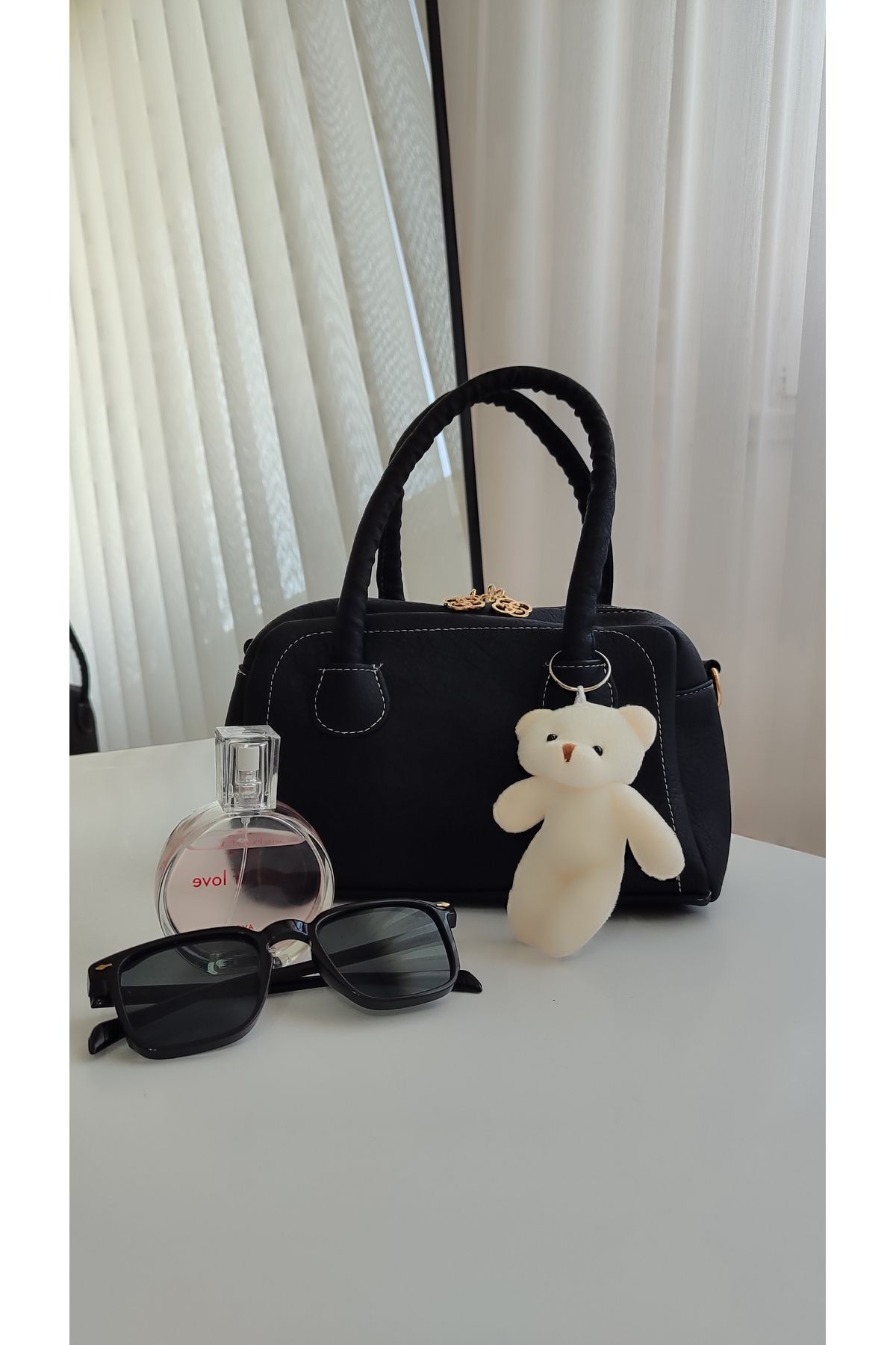 ravensbag AYCIKLI EL ve OMUZ KADIN ÇANTA