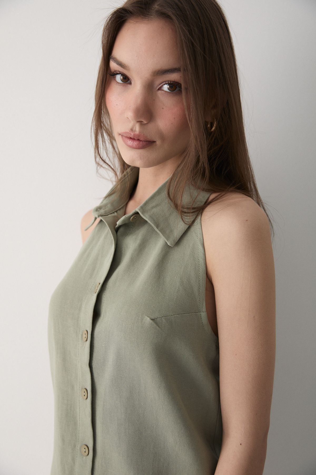 JASTE-Women's Khaki Collared Zero Sleeve Linen Blouse with Open Elastic Back 4