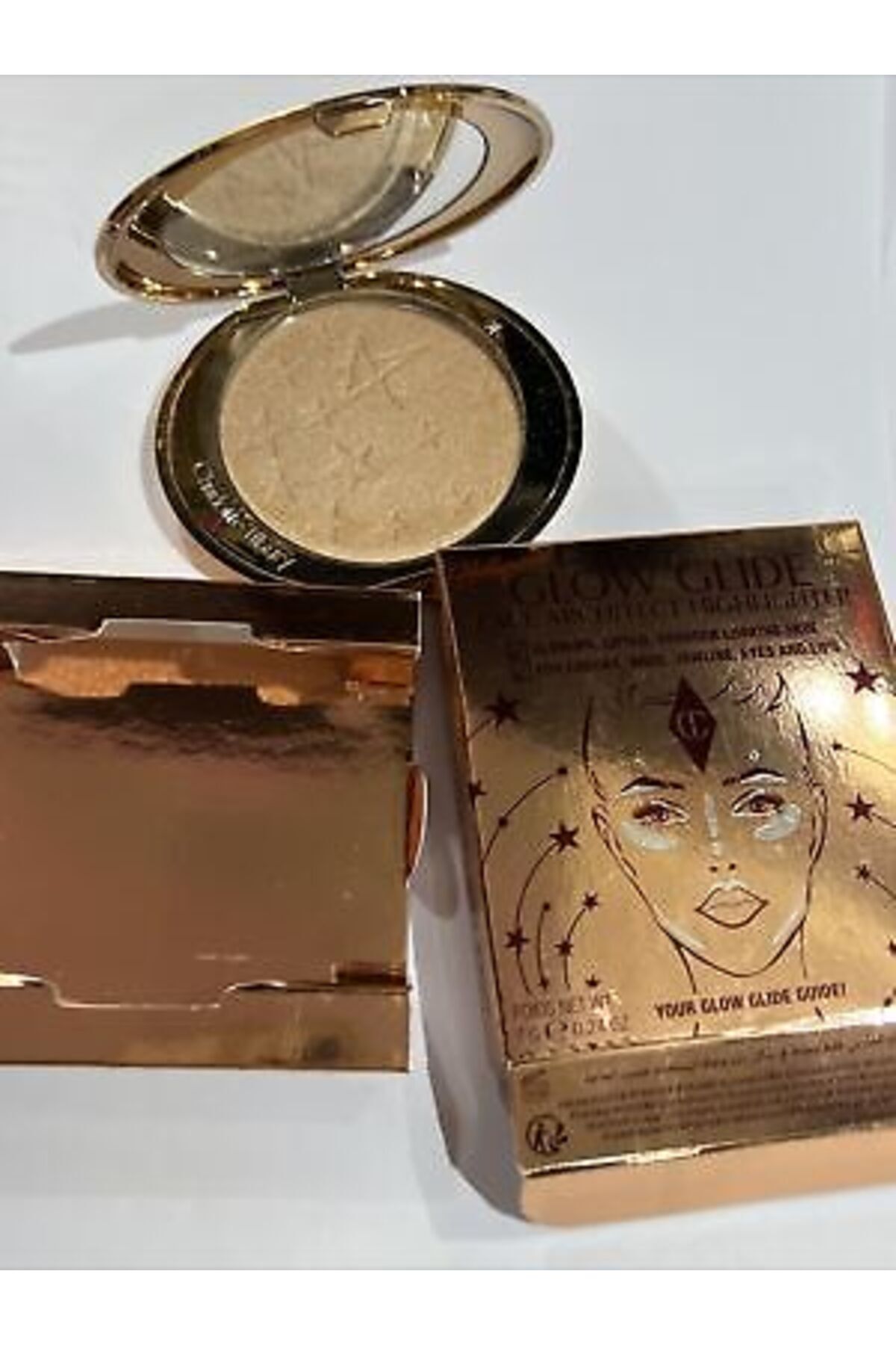 charlotte tilbury-HOLLYWOOD GLOW GLIDE FACE ARCHITECT HIGHLIGHTER Champagne Glow 1