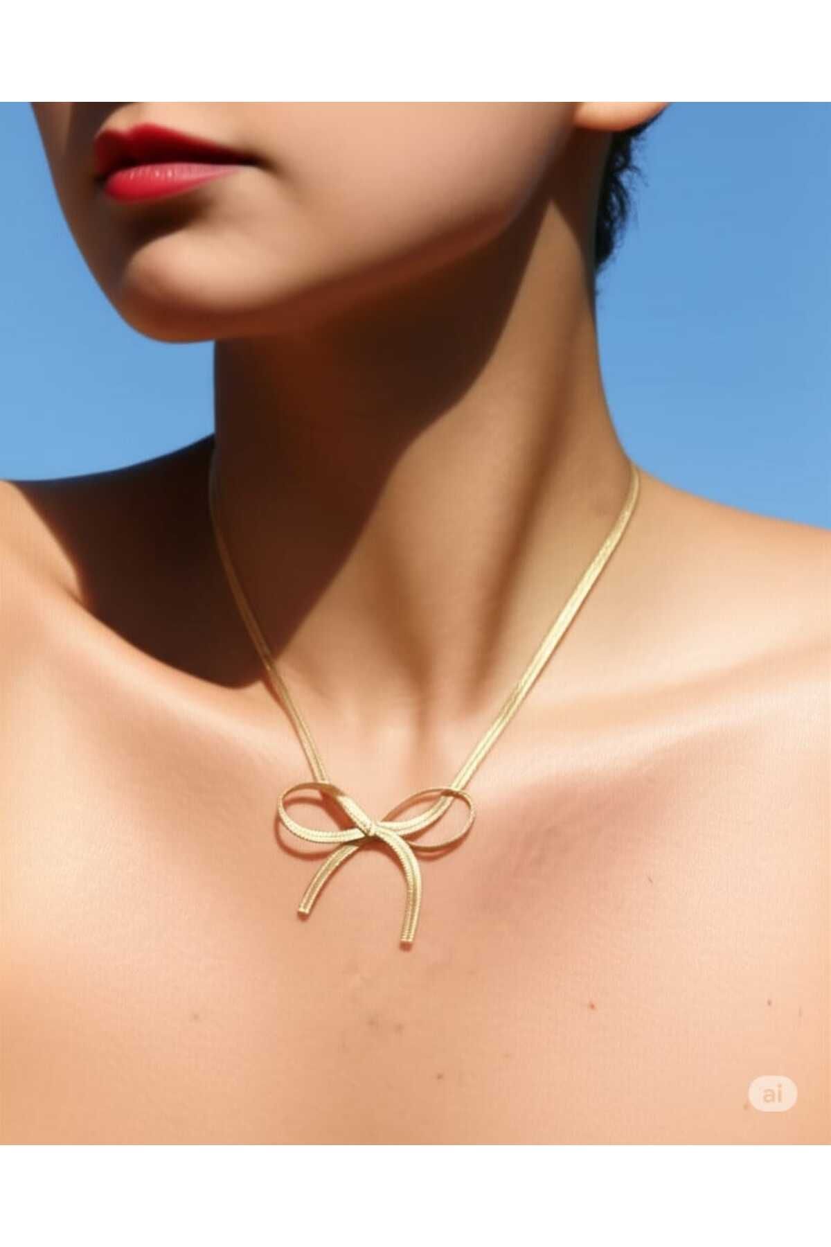 DİAPANTE Altın Renk Kurdele Tasarımlı Şık Trend Kadın Kolye – Modern ve Zarif Stil