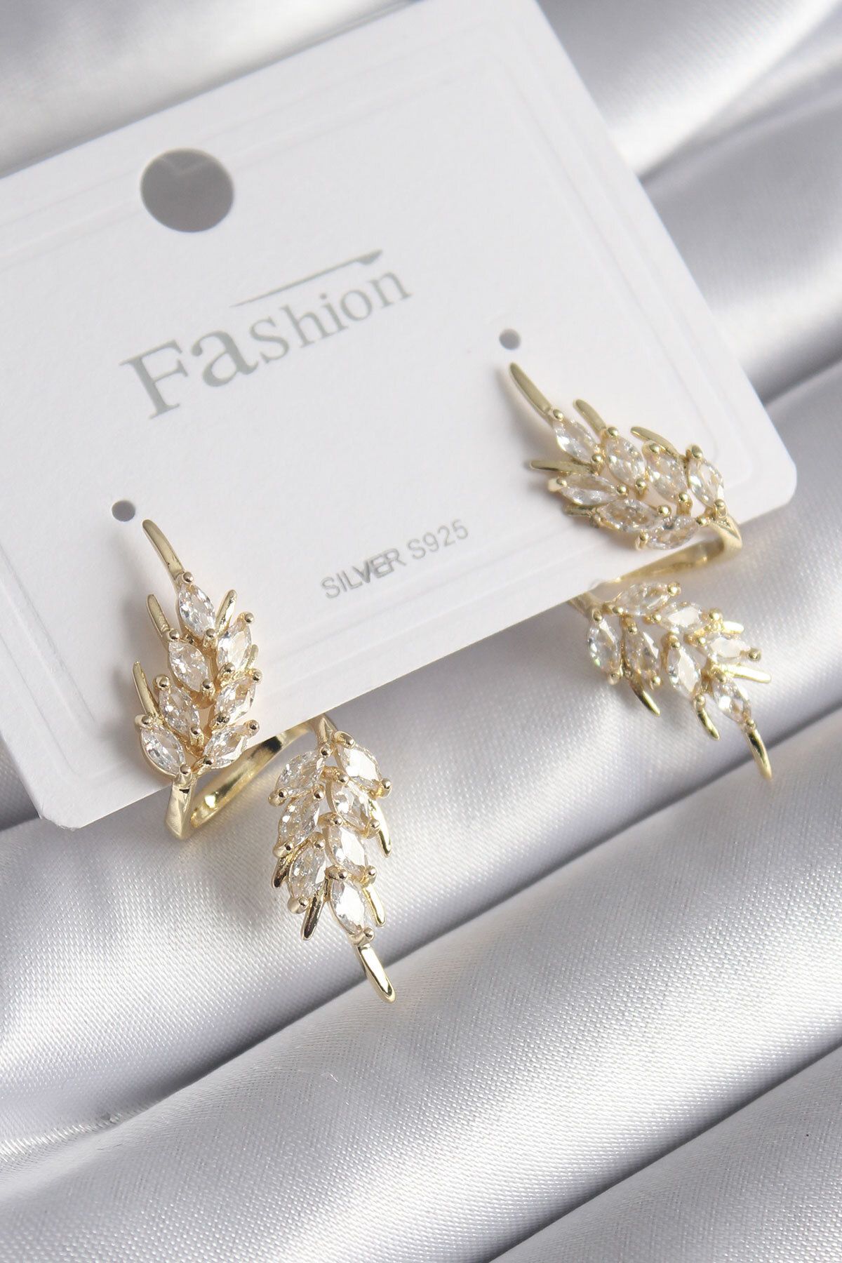 Clariss Pirinç Gold Renk Zirkon Taşlı Yaprak Model Kadın Küpe