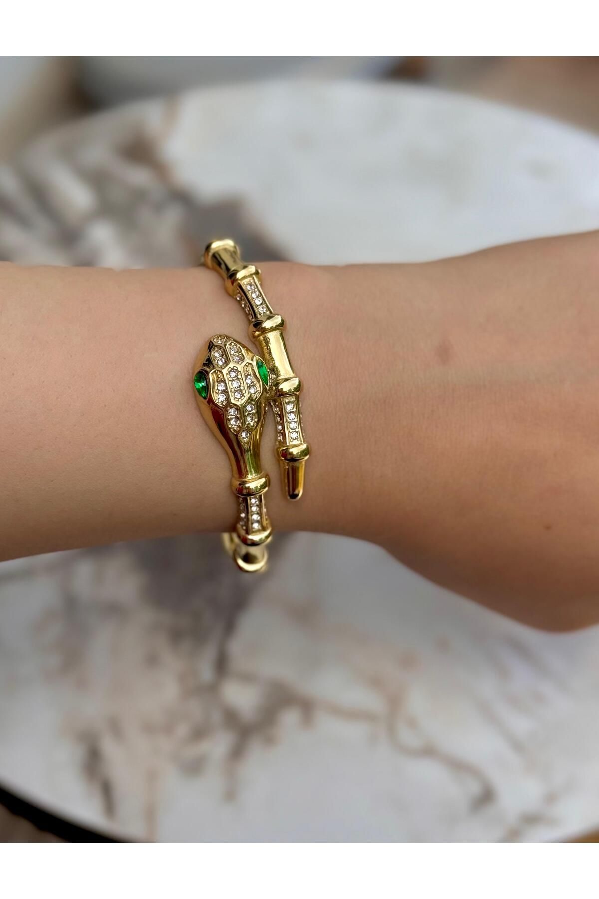 Glitterring KADIN gold renk YILAN MODEL TAŞ TASARIM ÇELİK BİLEKLİK KARARMAZ