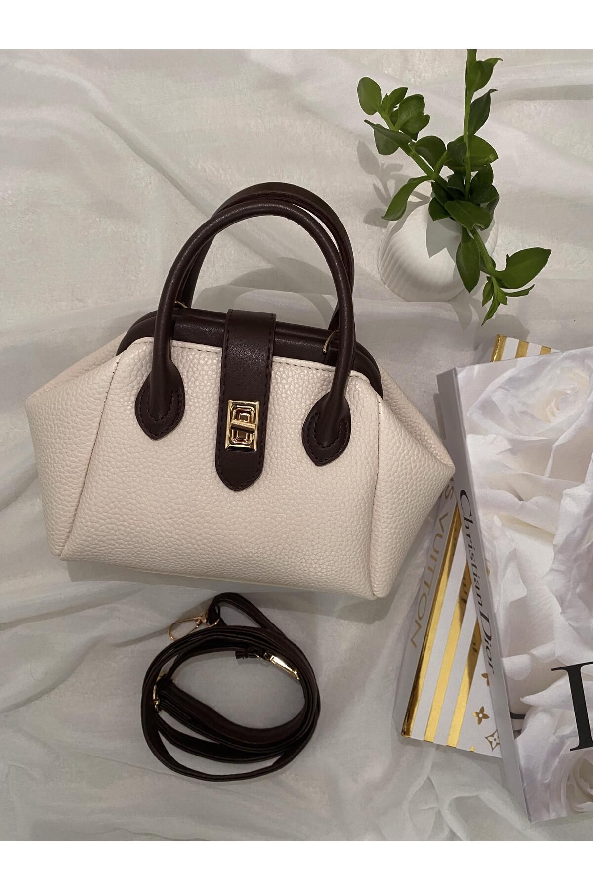STRUCTURE Structed Mini Tote Kilit Detaylı Krem Rengi El Çantası.ürünün Askı Ipi Bulunmaktadır.içi Astarlıdır.