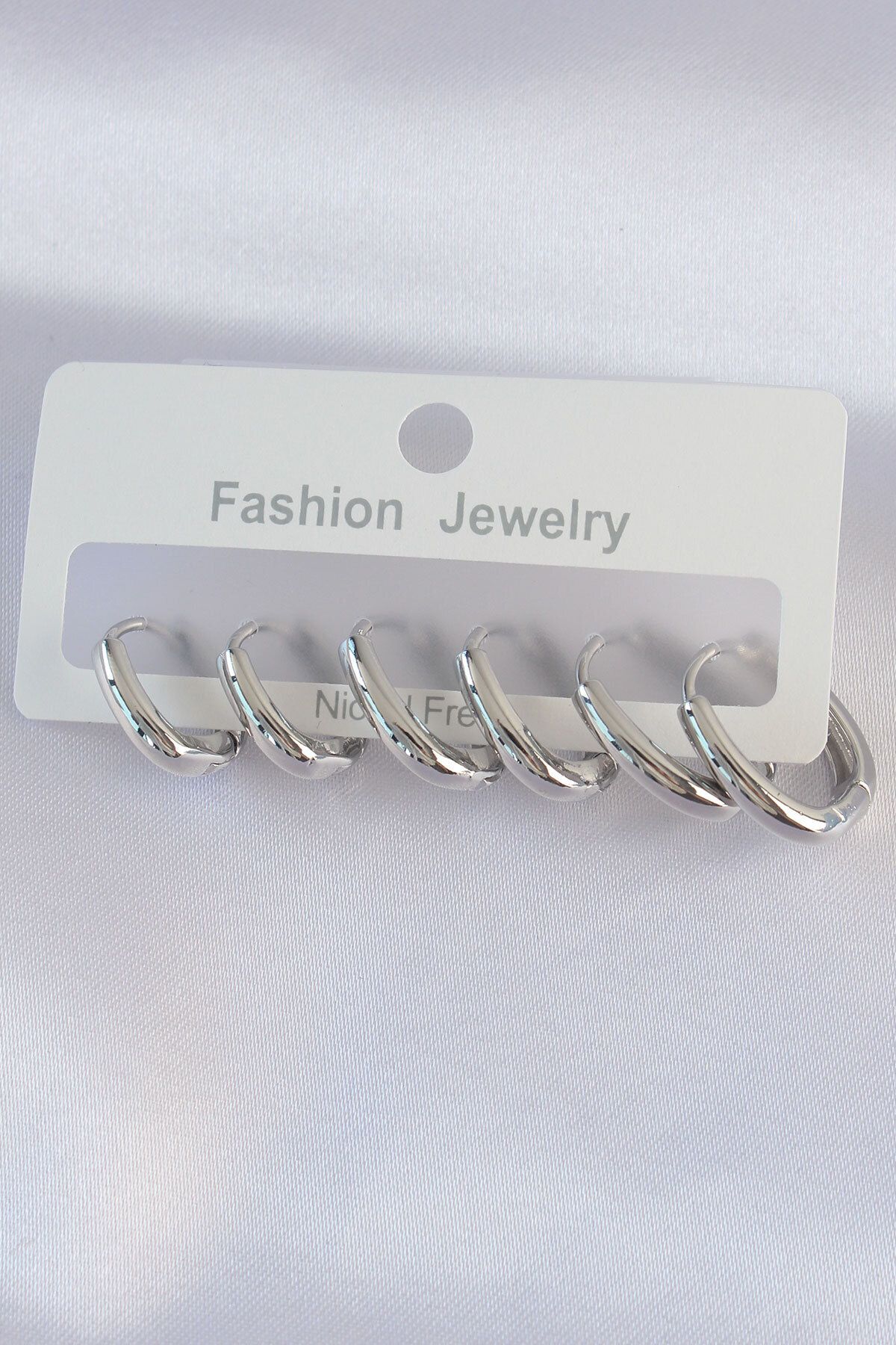 melfxxl eticaret Pirinç Gümüş Renk Oval Küpe Seti - Lisinya