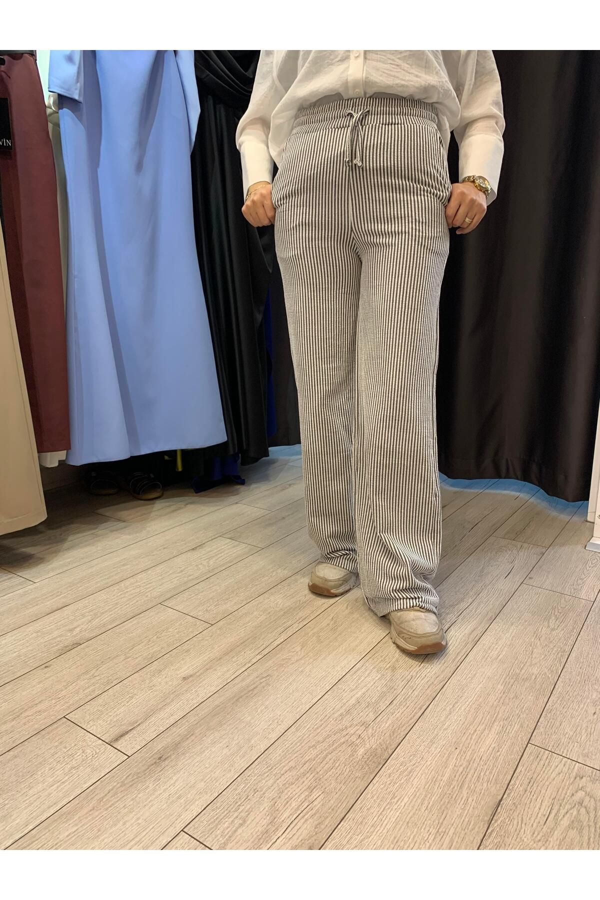 Moda Asrın Dökümlü çizgili keten karışımlı pantolon Füme