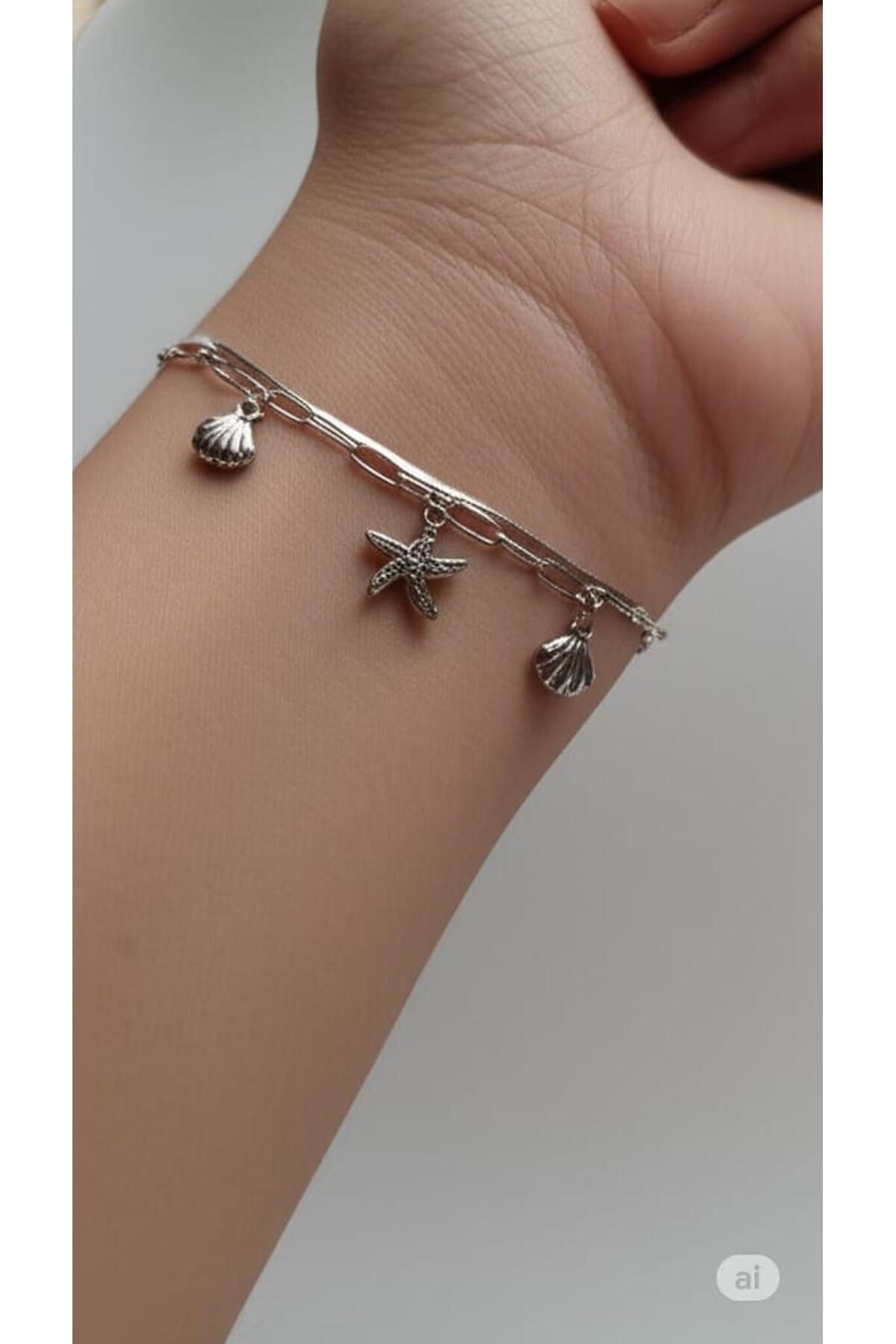 BESMYAR JEWELS Deniz Yıldızı ve Deniz Kabuğu Figürlü Sallantılı Kadın Bileklik