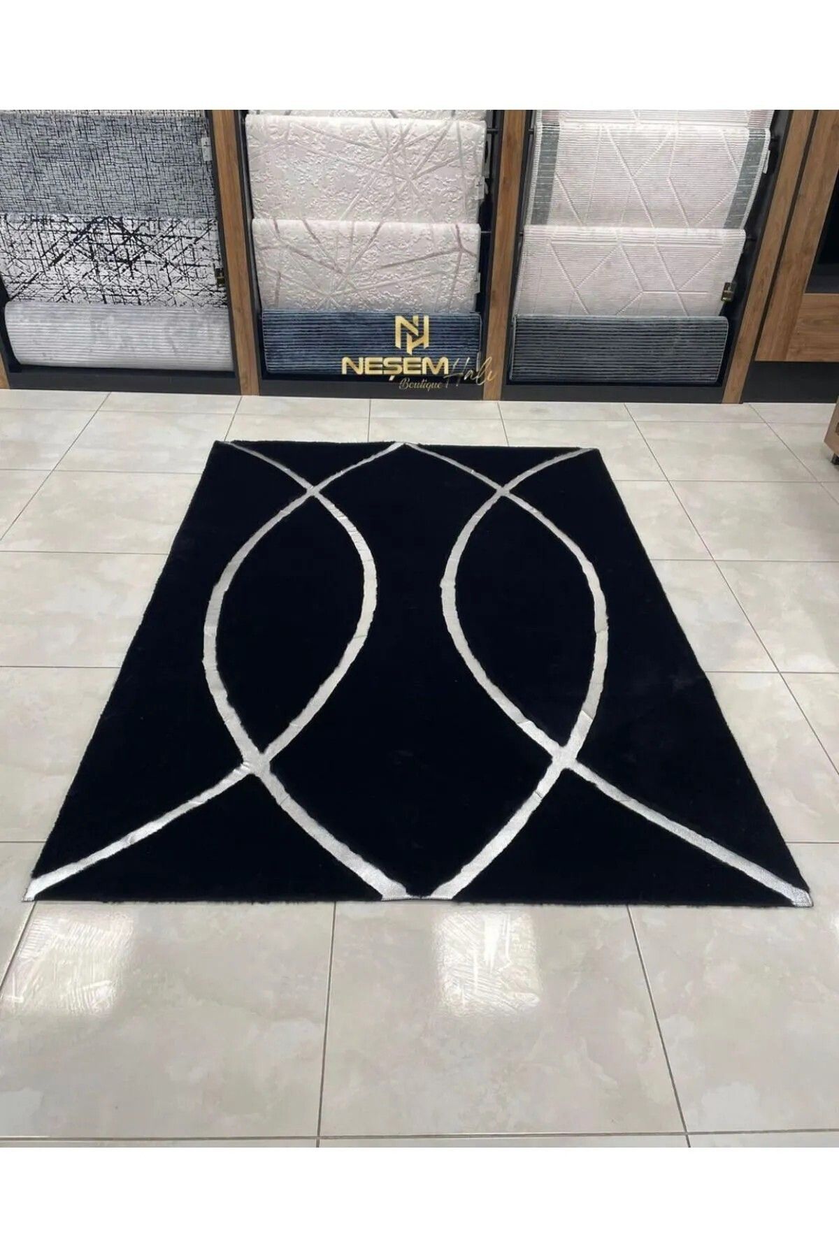 Neşem Halı Boutique özel tasarım siyah peluş varaklı deri halı.