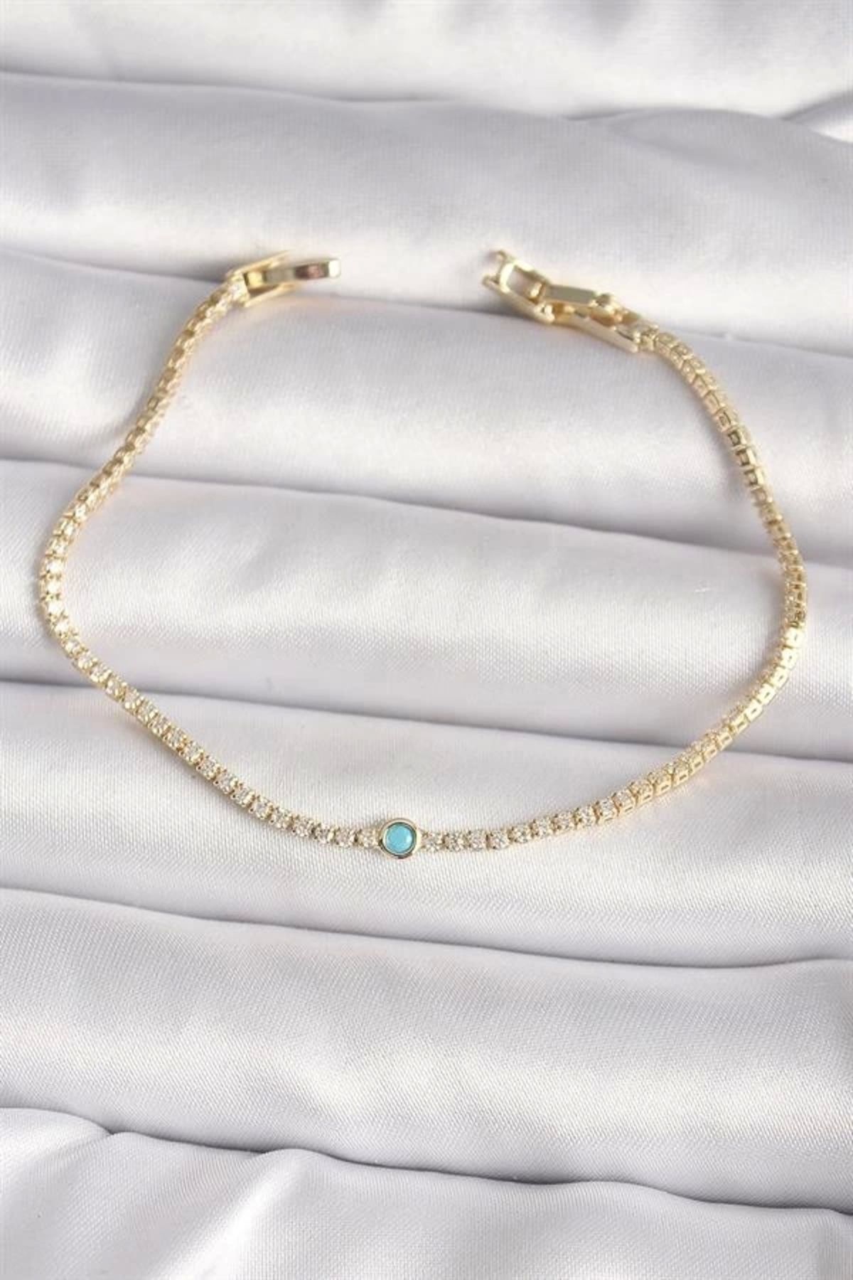 Lale Moda Pirinç Gold Renk Su Yolu Zirkon Taşlı Mavi Taşlı Kadın Bileklik