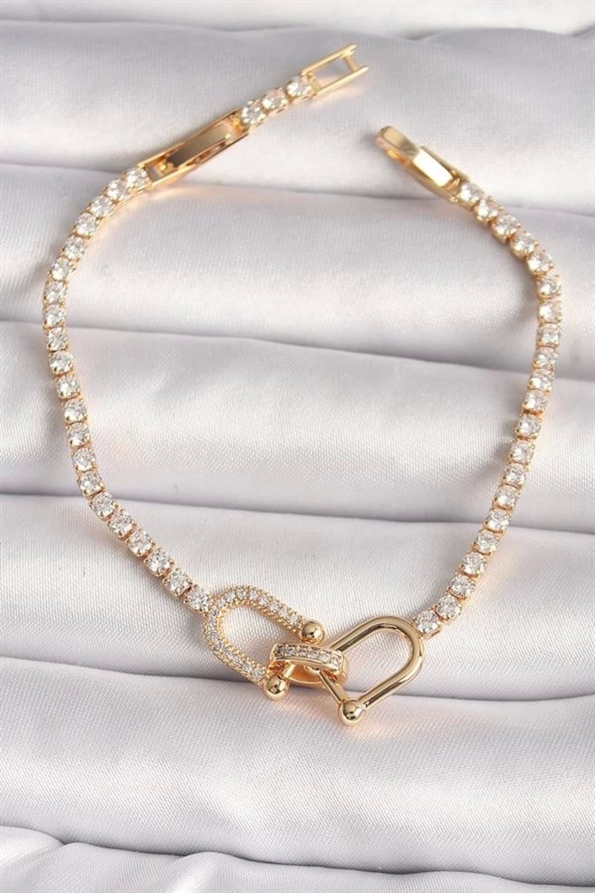 Lale Moda Pirinç Gold Renk Su Yolu Zirkon Taşlı Model Kadın Bileklik