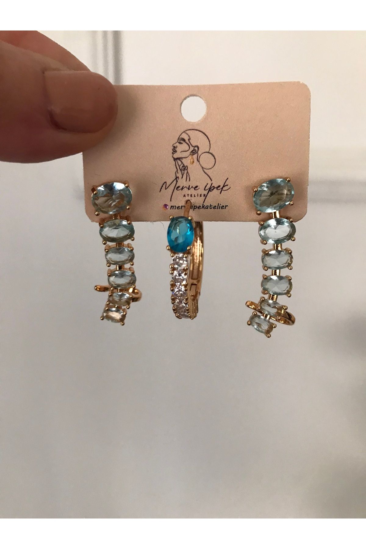 shop PASLANMAZ ÇELİK MAVİ RENKLİ ÜÇLÜ TAŞLI GOLD DETAYLI KARARMAZ KÜPE