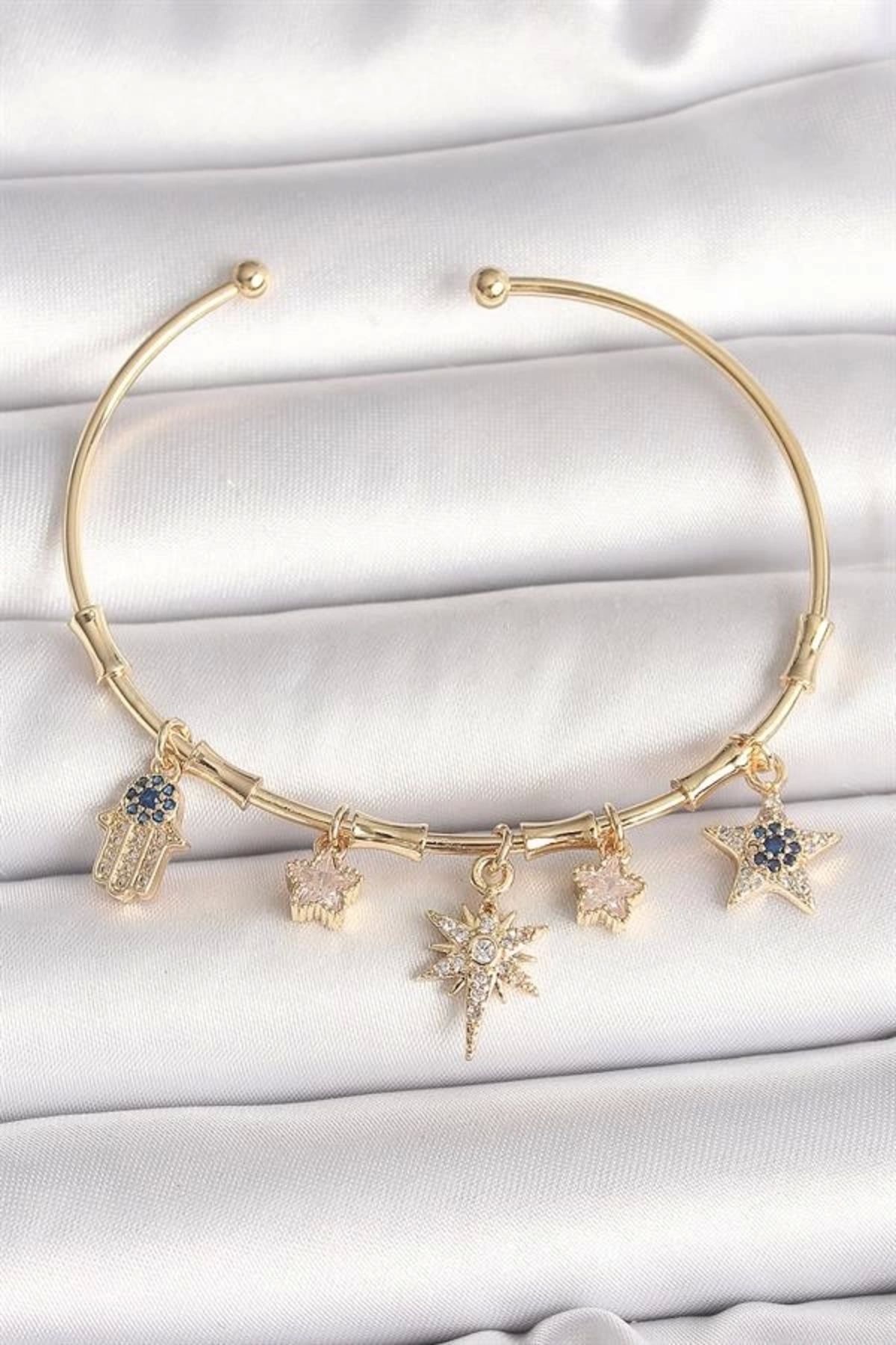Lale Moda Pirinç Gold Renk Sallantı Zirkon Taşlı Kutup Yıldız Model Charm Model Kadın Bileklik