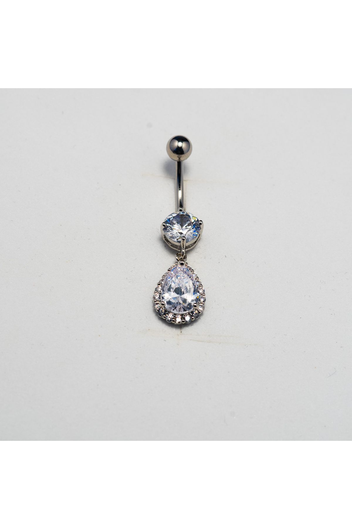 Piercing by Sever DAMLA TAŞ SALLANTILI MODEL CERRAHİ ÇELİK GÖBEK BELLY PIERCING… GÜMÜŞ/SILVER RENKLİ ve ŞEFFAF TAŞLI.