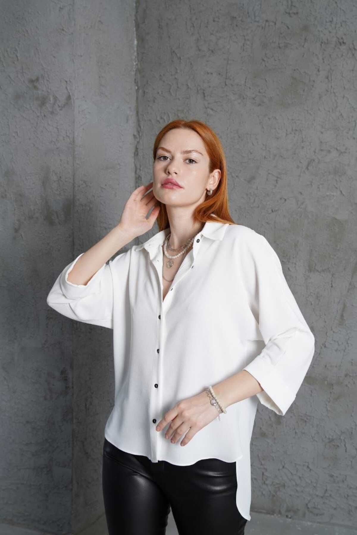 kazarina kadın önü kısa arkası uzun truvakar kollu oversize gömlek