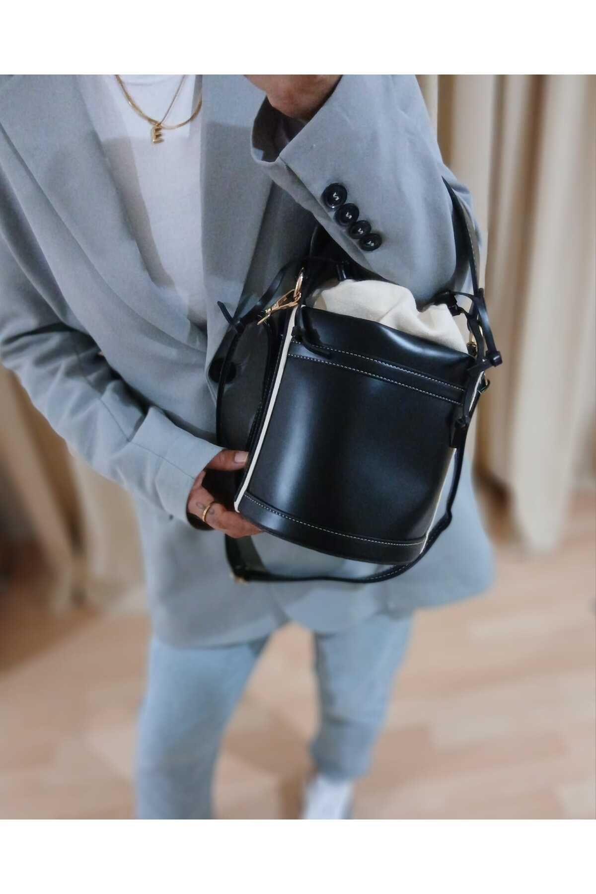 RUES KADIN BÜZGÜLÜ KOVA MODEL SADE VE ŞIK OMUZ ÇANTASI