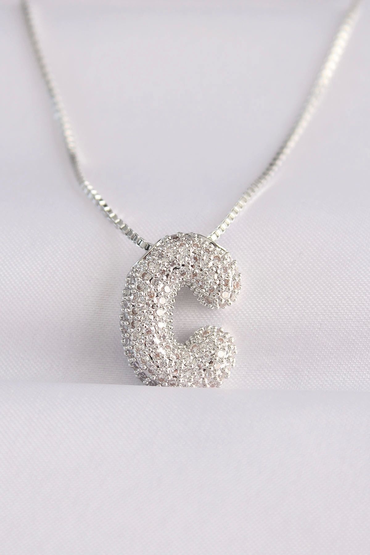 YNT İthalat 316L Çelik Zincirli Zirkon Taşlı C Harfli Silver Renk Bubble Kolye