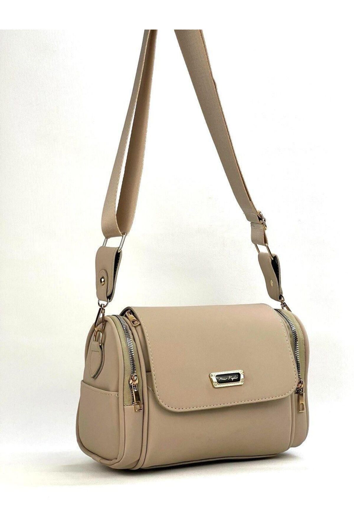 byFOX Fashion Kadın 6 Gözlü Silindir Çapraz Çanta Armalı (arma değişiklik gösterebilir)En:24cm Boy:16cm Dip:9cm