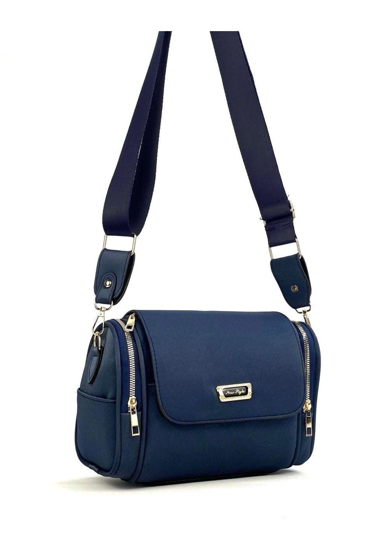 byFOX Fashion Kadın 6 Gözlü Silindir Çapraz Çanta Armalı (arma değişiklik gösterebilir)En:24cm Boy:16cm Dip:9cm