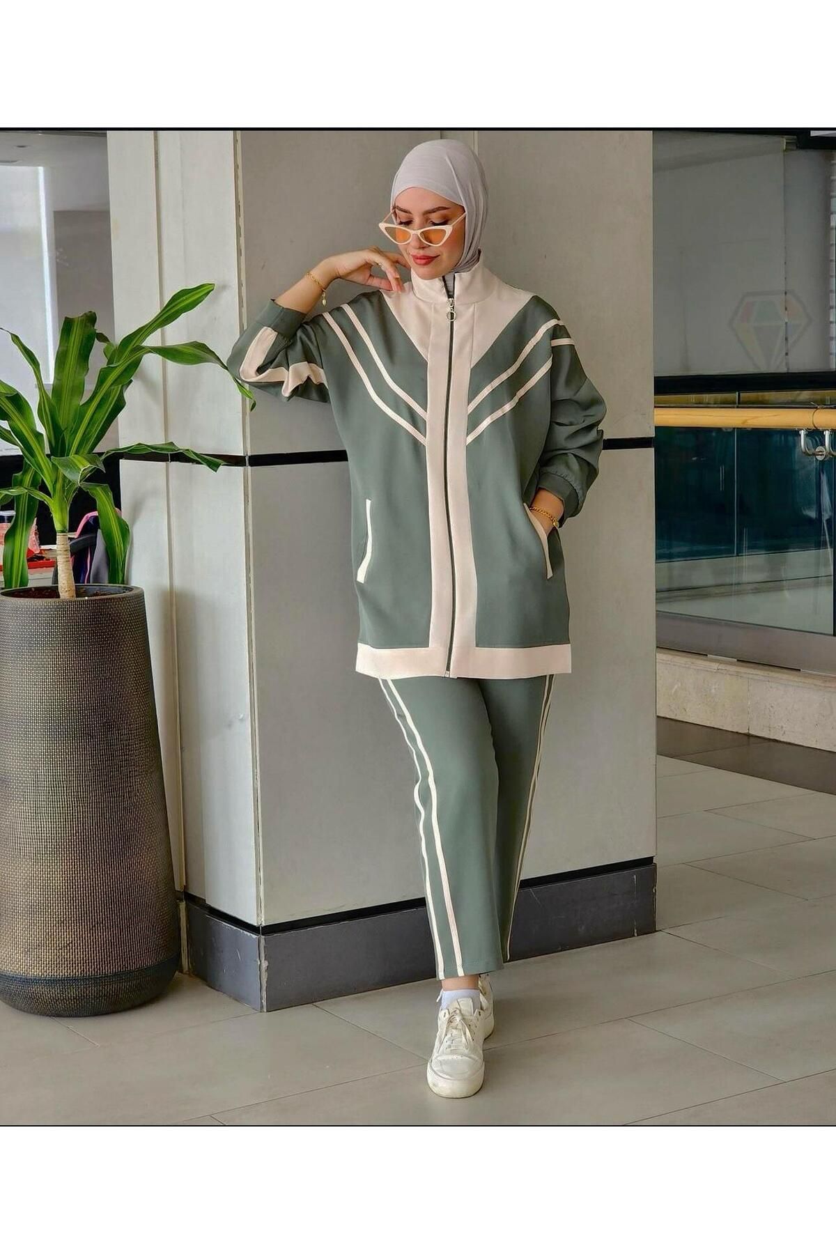 BURCU TESETTÜR cizgi desenli eteği garnili eşofman takımı