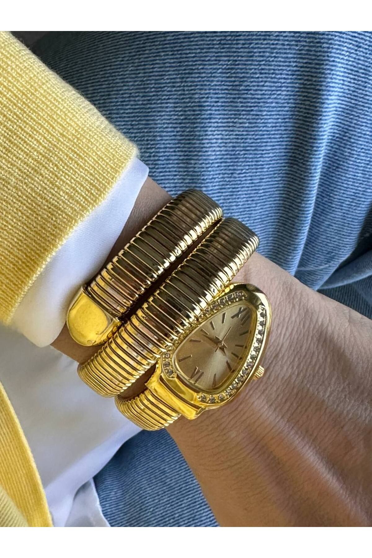 Esmeray Aksesuar Gold Renk Kristal Taşlı Sarı Kadranlı Yılan Tasarım Spiral Kadın Kol Saati