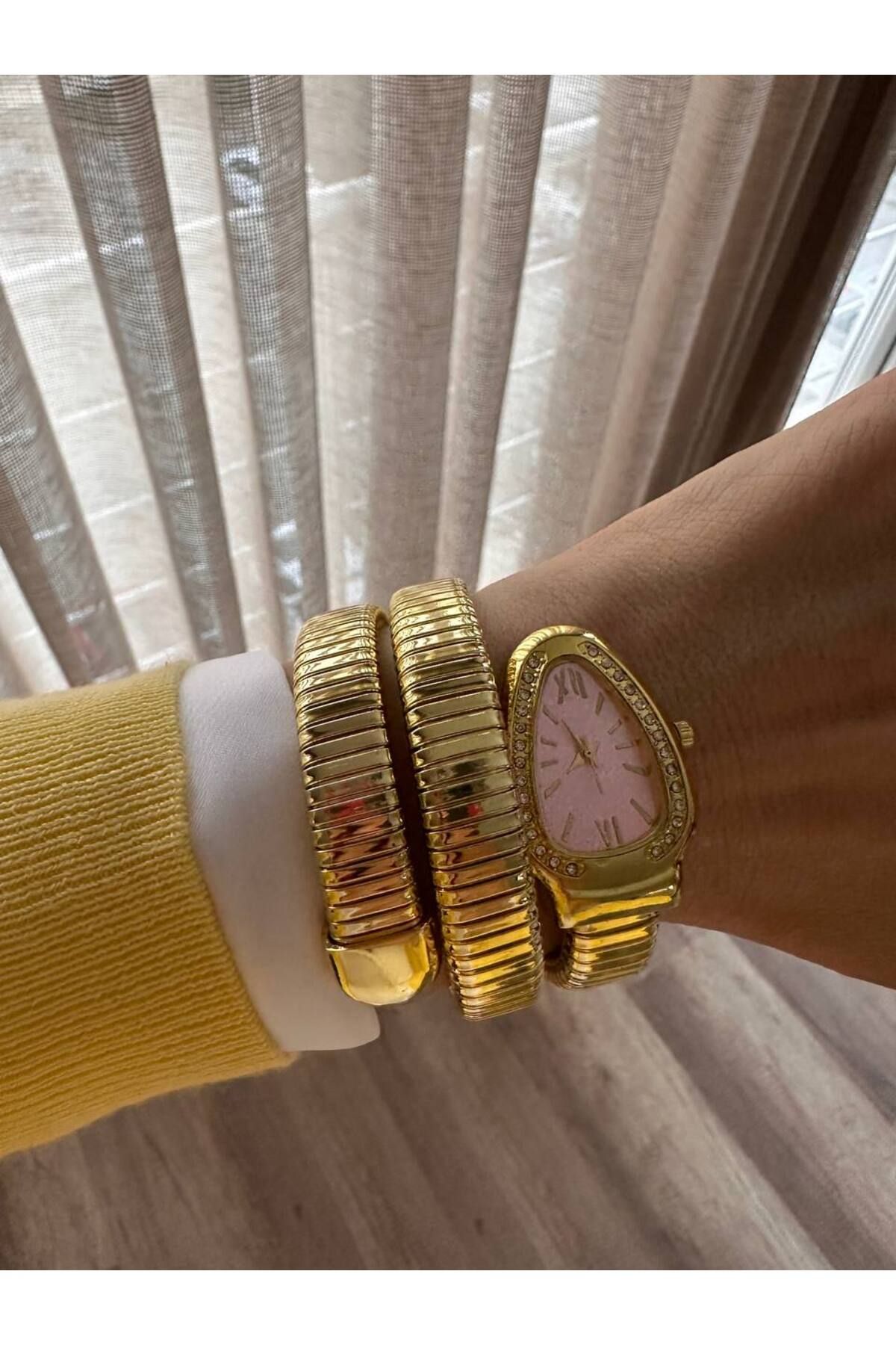 Esmeray Aksesuar Gold Renk Kristal Taşlı Toz Pembe Kadranlı Yılan Tasarım Spiral Kadın Kol Saati