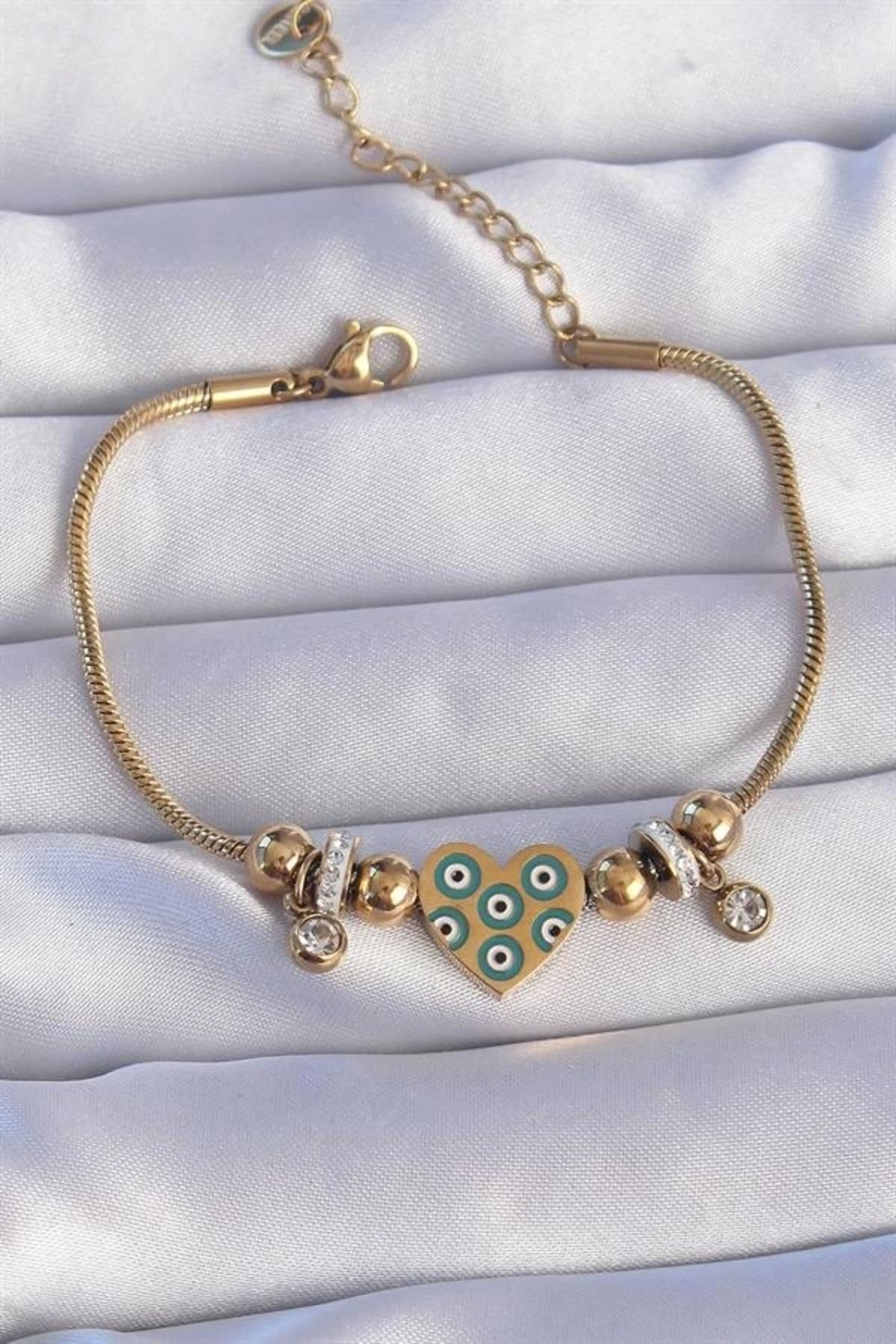 Lale Moda 316L Çelik Gold Renk Zirkon Taşlı Nazarlı Kalp Tasarımlı Bileklik