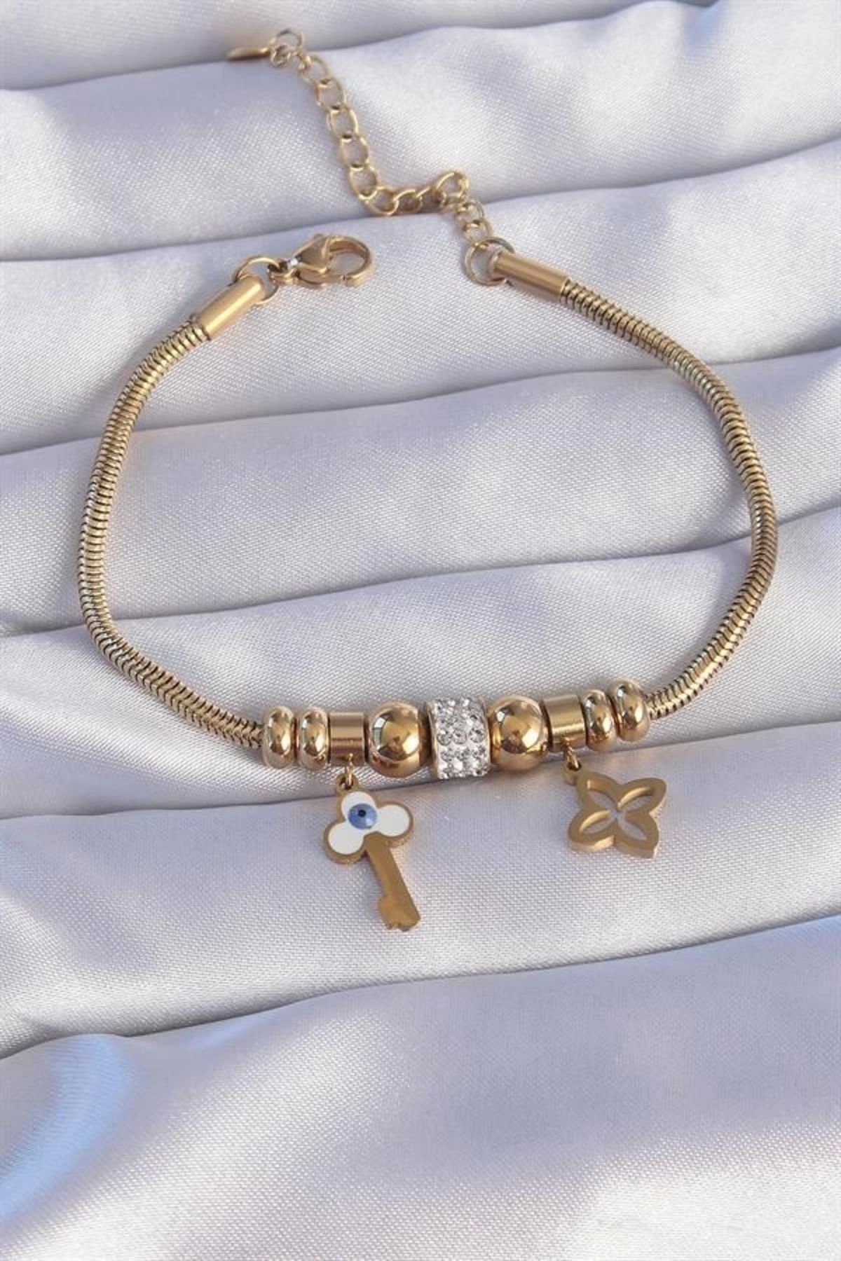 Lale Moda 316L Çelik Gold Renk Zirkon Taşlı Yonca Detay Nazarlı Anahtar Tasarımlı Bileklik