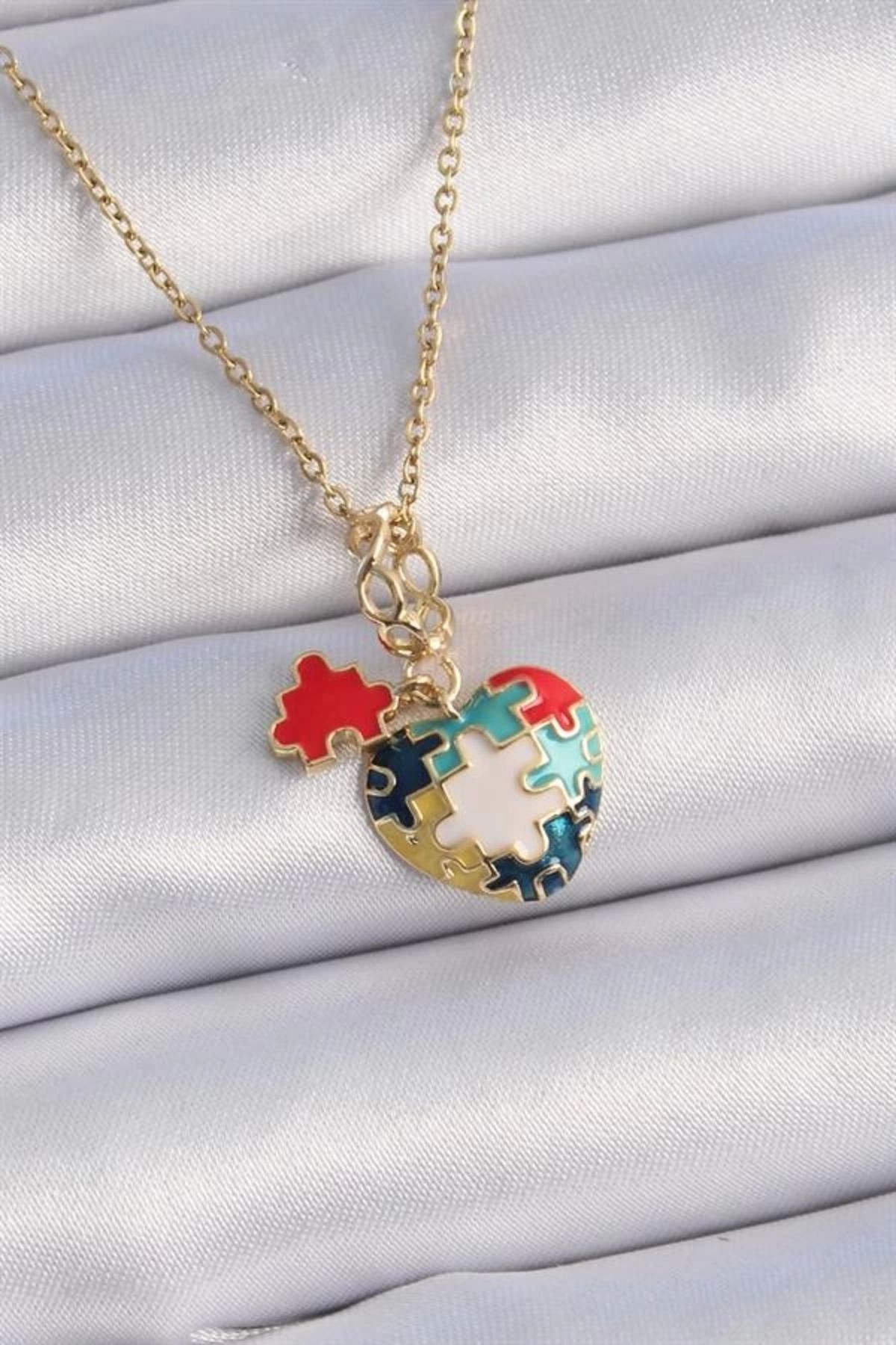 Lale Moda 316L Çelik Gold Renk Yapboz Motif Kalp Figür Charm Model Kadın Kolye