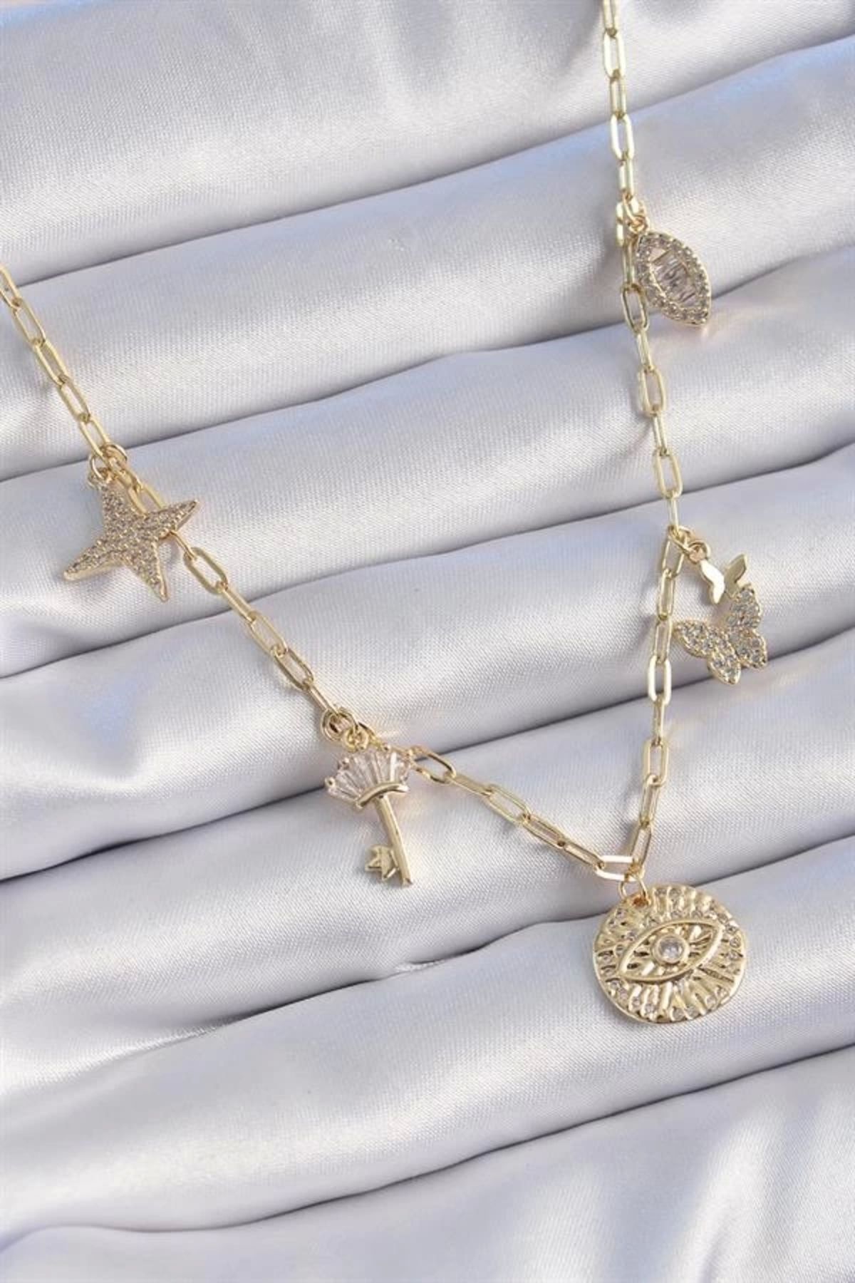 Lale Moda Gold Renk Pirinç Gold Renk Zirkon Taş Detay Çoklu Figür Şans Kolyesi