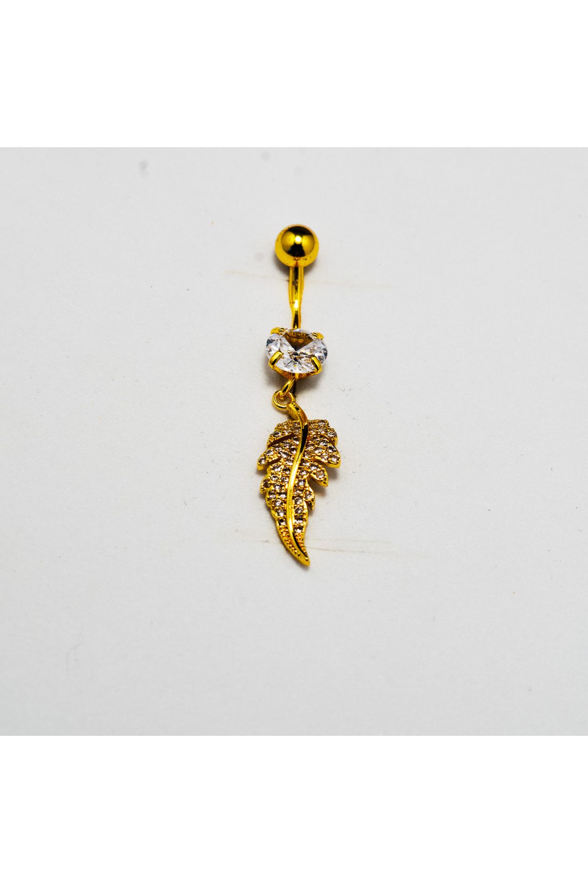 Piercing by Sever TÜY YAPRAK SALLANTILI CERRAHİ ÇELİK GÖBEK BELLY PIERCING… ALTIN/GOLD RENKLİ ve ŞEFFAF TAŞLI.