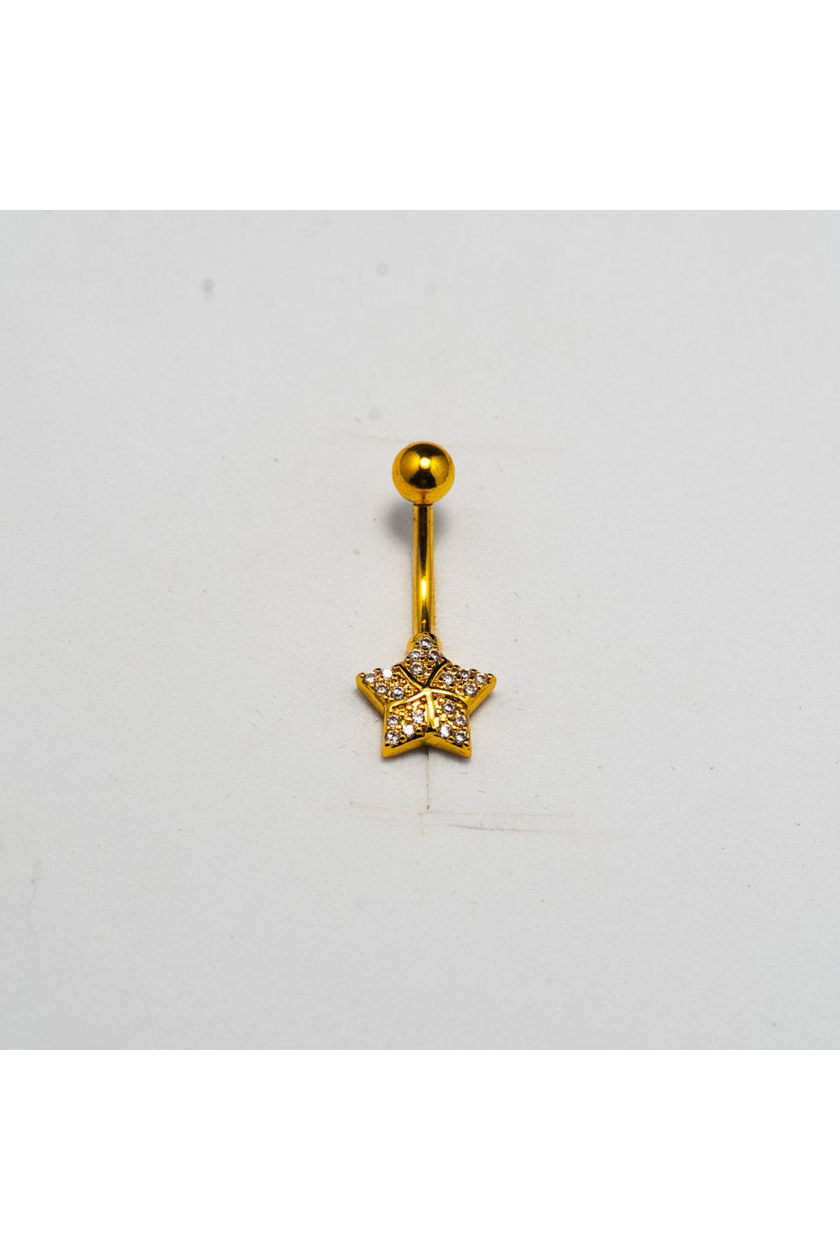 Piercing by Sever YILDIZ CERRAHİ ÇELİK GÖBEK BELLY PIERCING… ALTIN/GOLD RENKLİ ve ŞEFFAF TAŞLI.