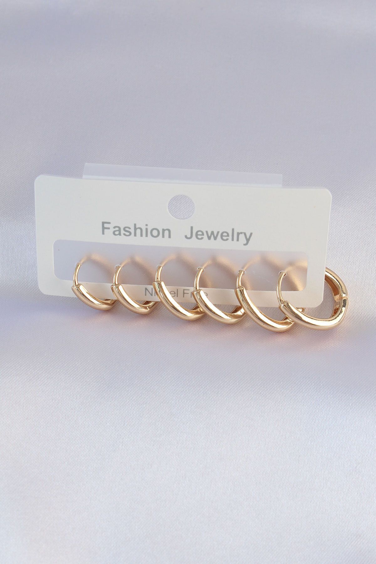 melfxxl eticaret Pirinç Gold Renk Oval Küpe Seti - Lisinya