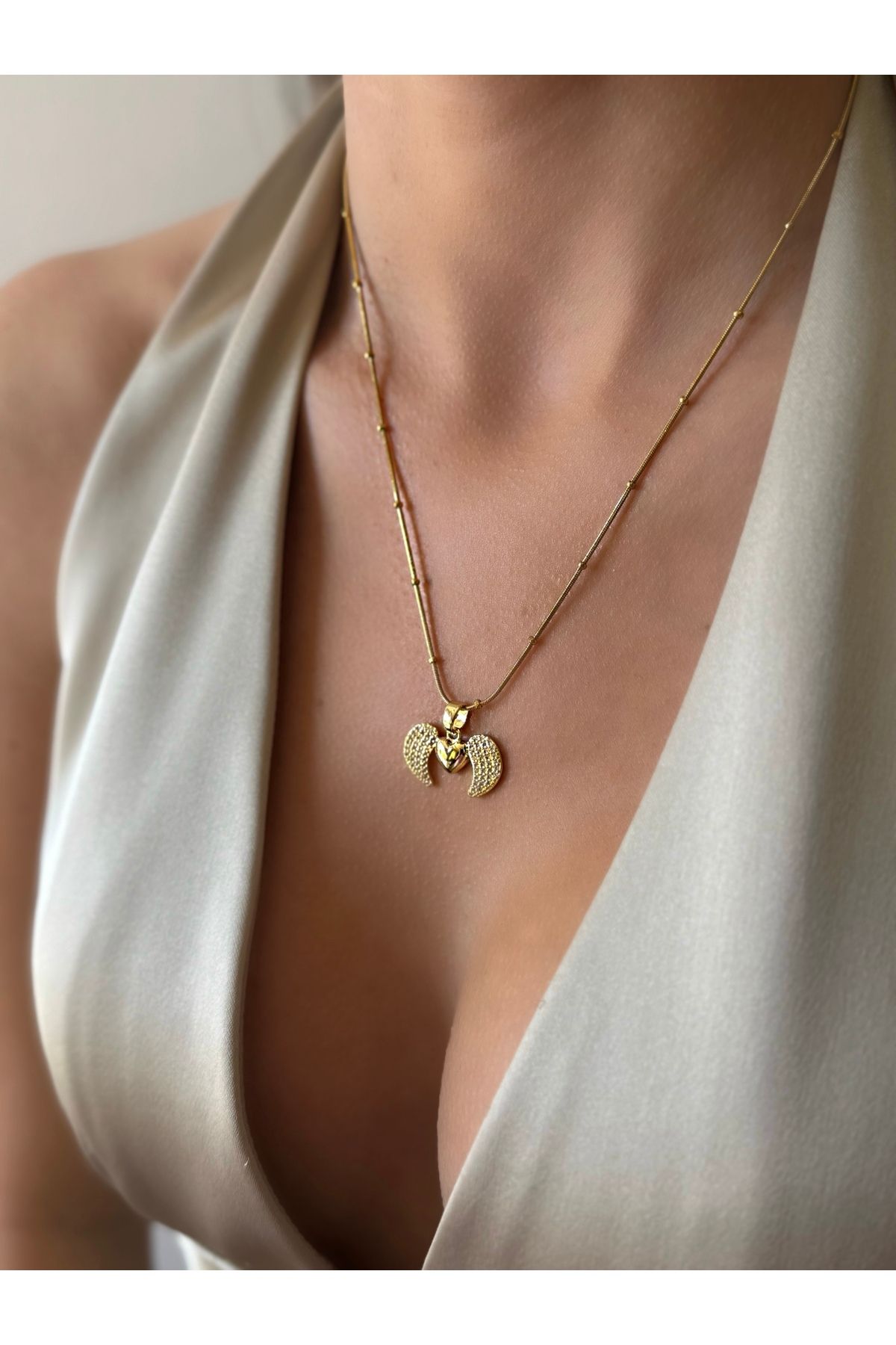 İNN JEWELLERY Çelik Kolye Kararmaz Kanat Figürlü (2 YIL İTHALATÇI GARANTİLİ)