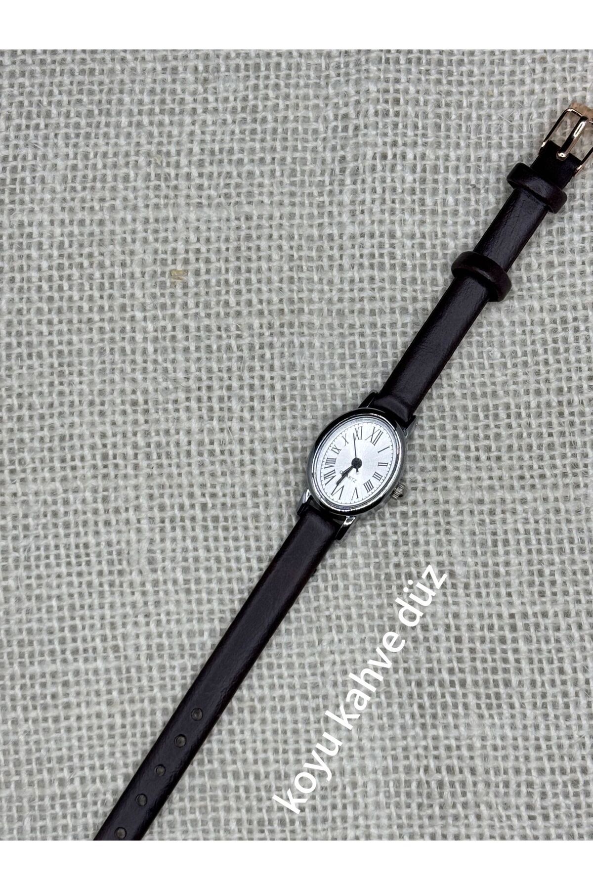 Brality Retro Still Minimal Kadın Kol Saati Vintage Model GÜMÜŞ Renk Kasa KOYU KAHVE RENK Kordon 0109