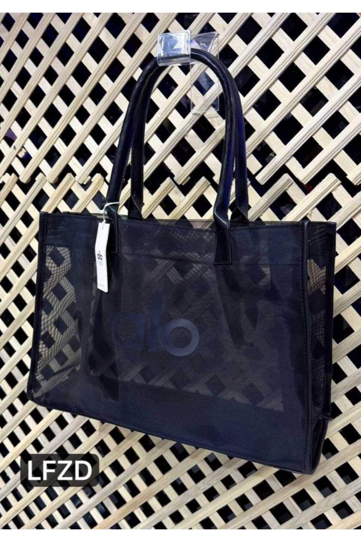 bynarincollection günlük şeffaf model kol çantası