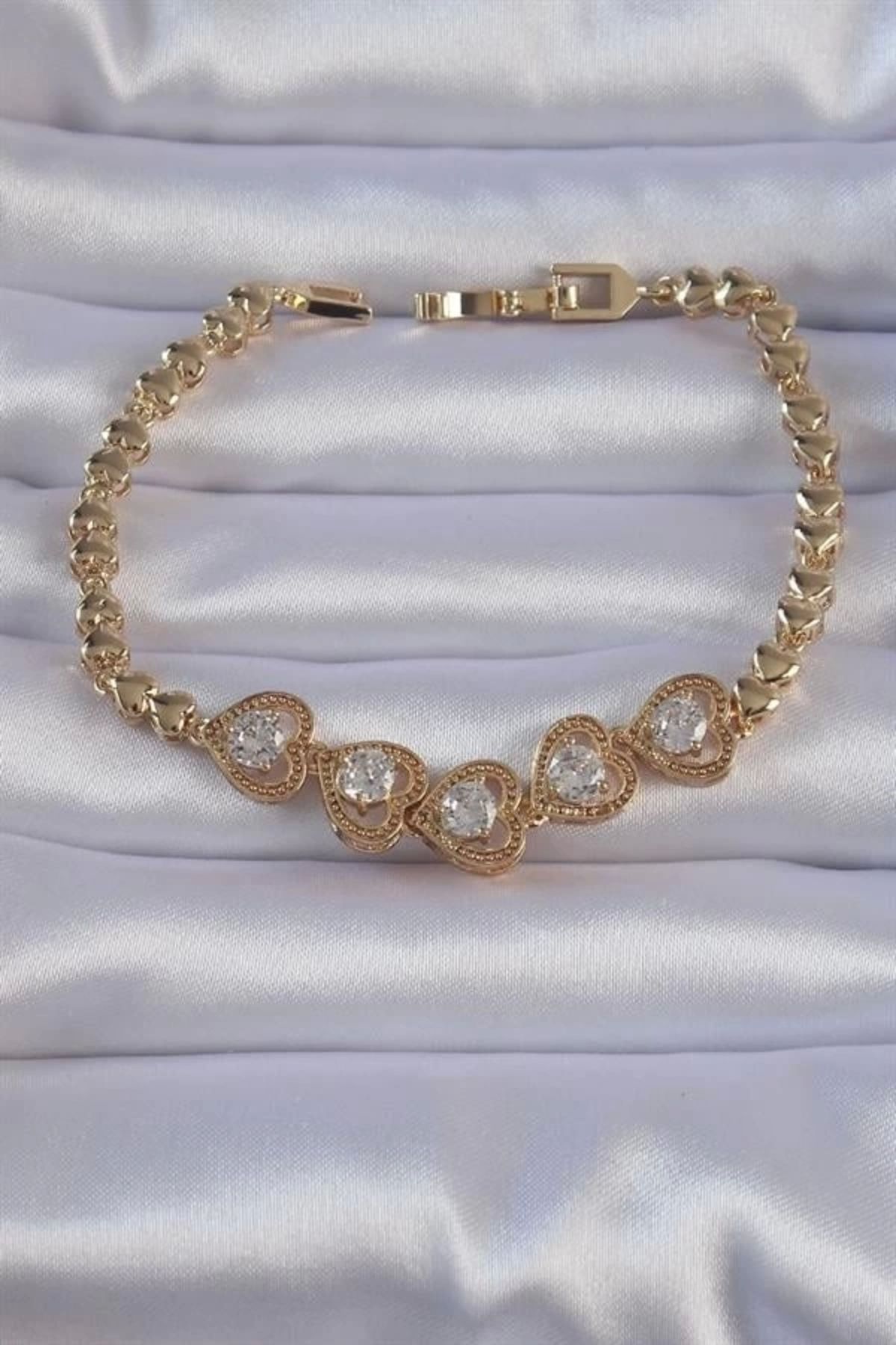 Lale Moda Pirinç Gold Renk İçi Zirkon Taşlı Kalp Figürlü Bileklik