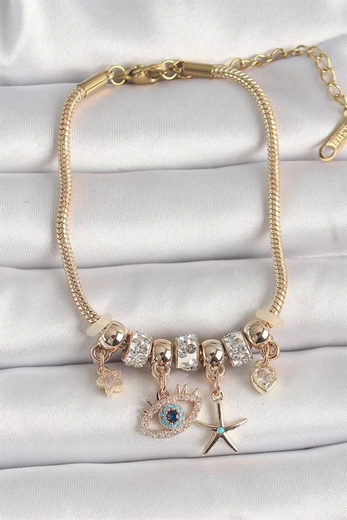 Lale Moda Pirinç Gold Renk Zincir Sallantı Zirkon Taşlı Göz Figür Yıldız Detay Kadın Bileklik