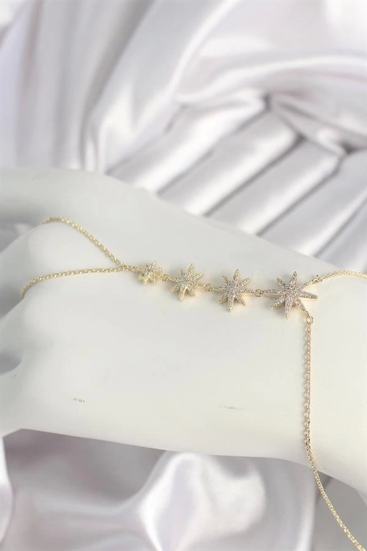 Lale Moda Pirinç Gold Renk Zirkon Taşlı Kutup Yıldız Model Kadın Şahmeran