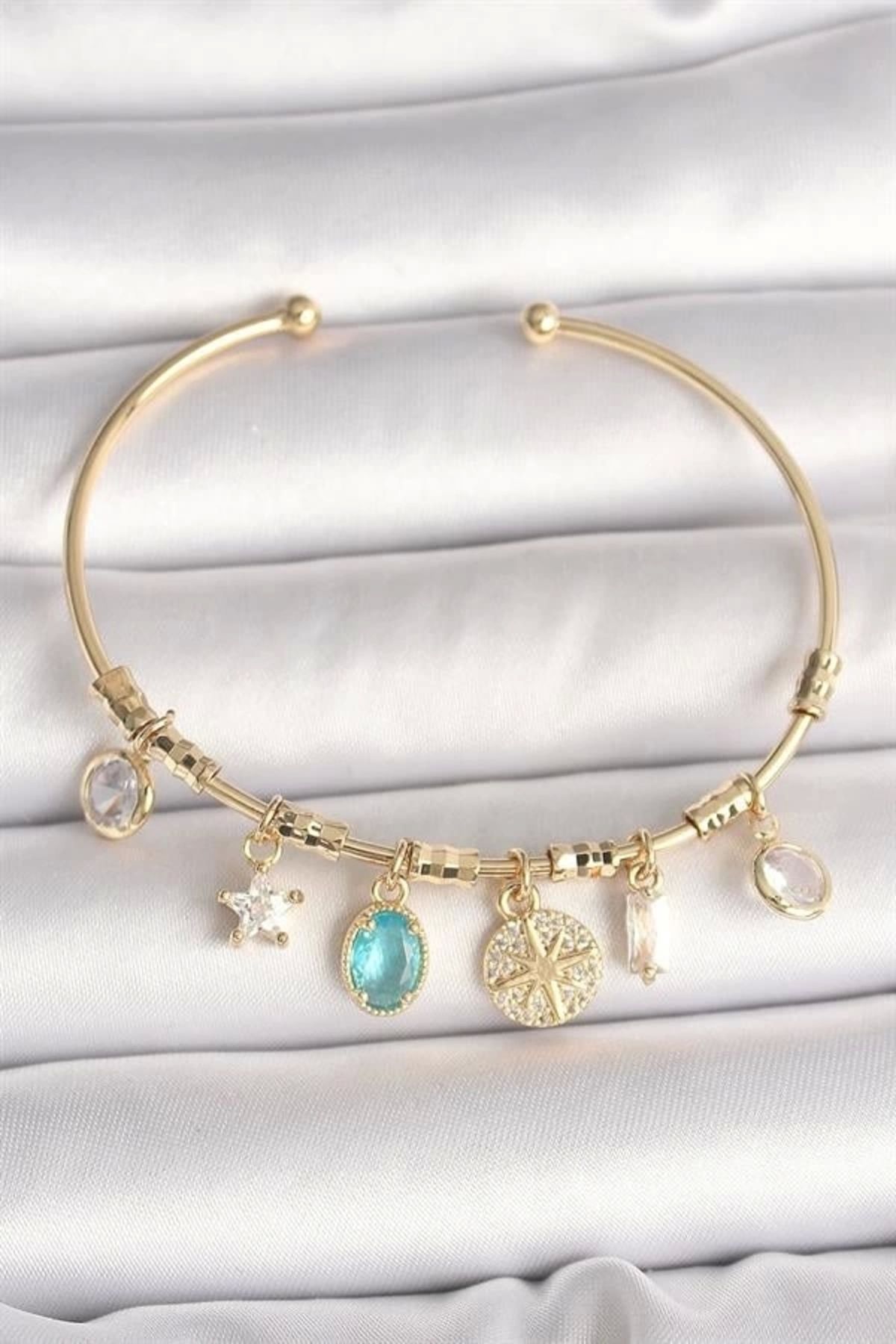 Lale Moda Pirinç Gold Renk Sallantı Zirkon Taş Detaylı Pusula Figür Charm Kadın Bileklik