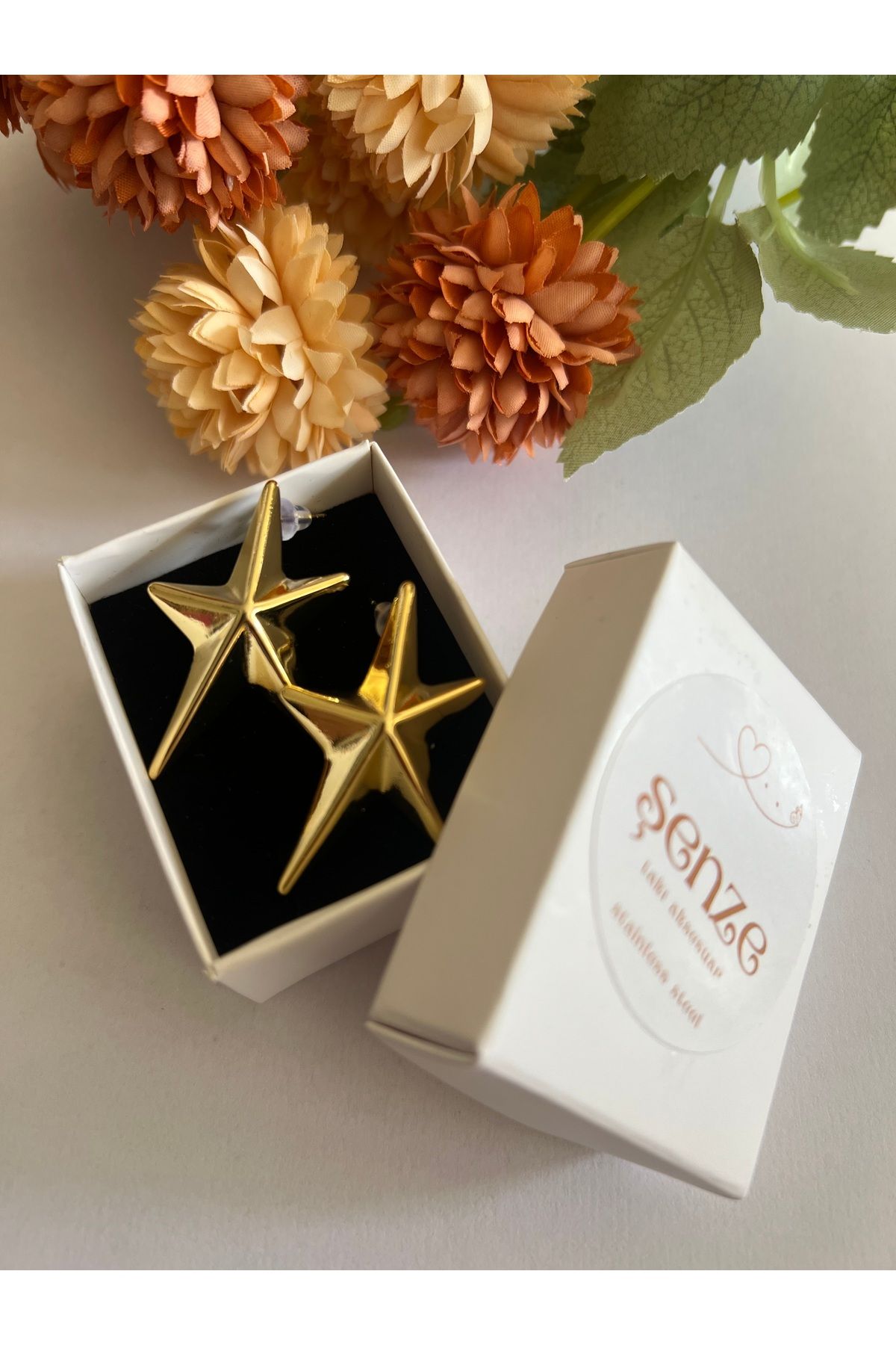 şenzetakı gold kuzey yıldızı küpe