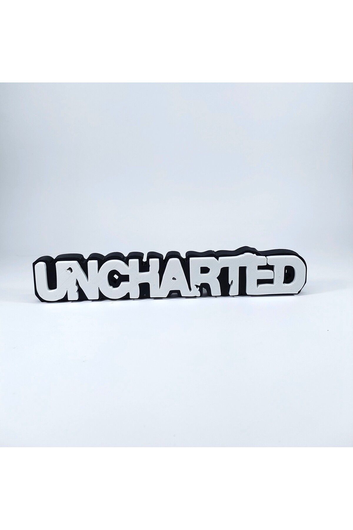 figur Uncharted 3D Logo Baskı Dekor