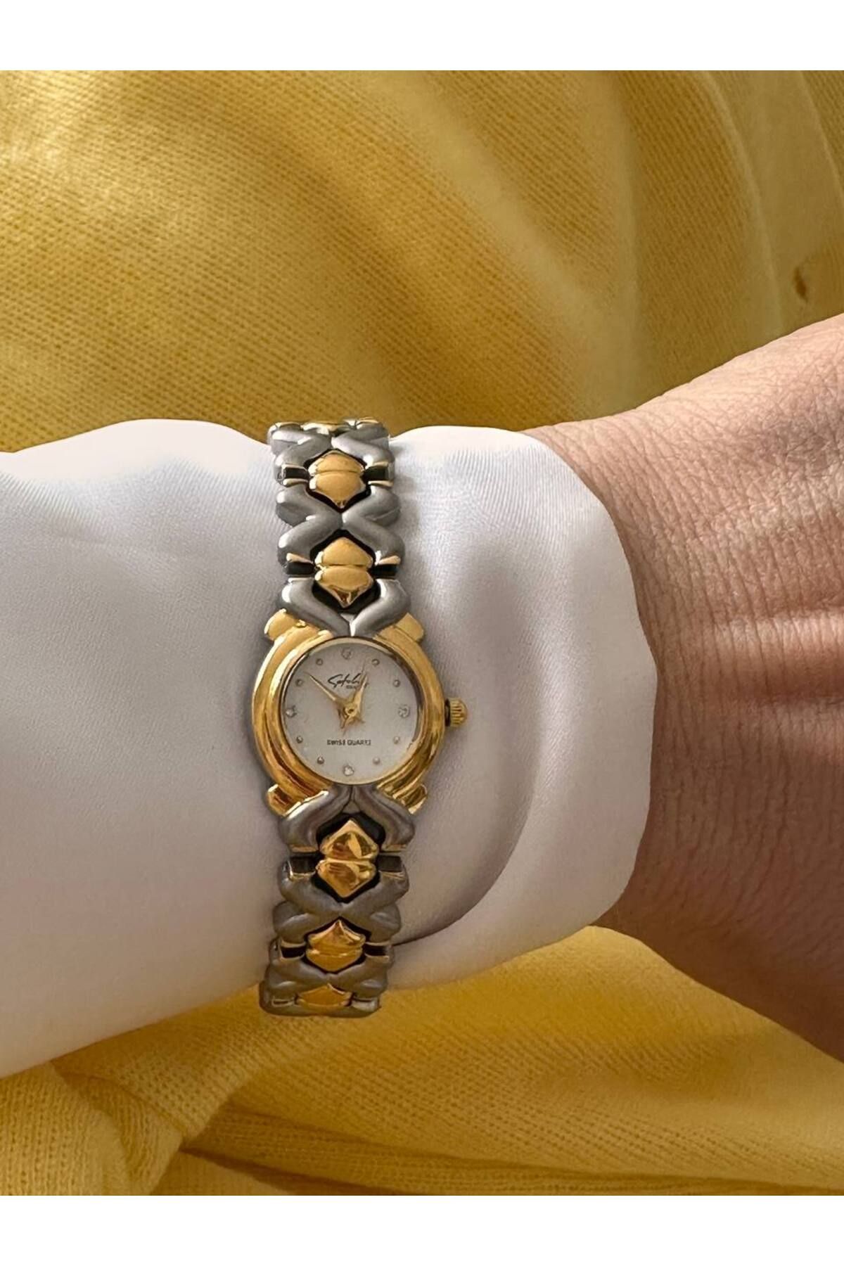 Esmeray Aksesuar Vip Çelik Gold ve Gümüş Renkli Premium Seri Beyaz Kadranlı Kadın Kol Saati