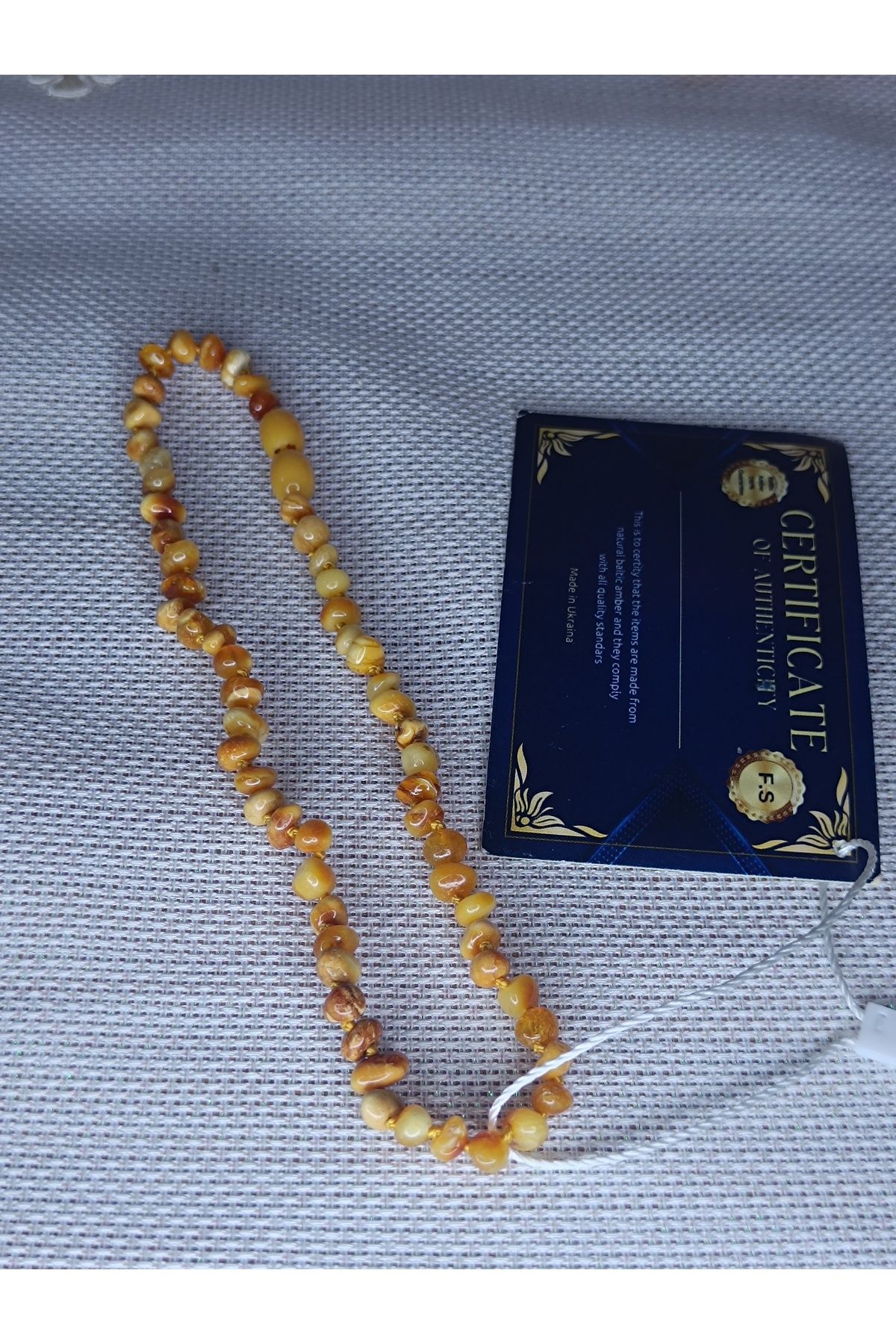 Damla Kehribar Bebek Kolye