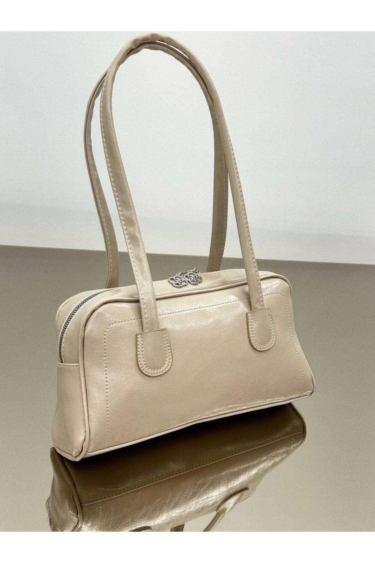 bynarincollection günlük rugan model kol çantası