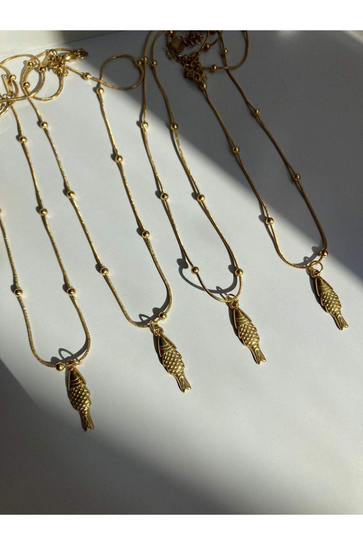 ırmco ÇELİK ANTİK BALIK FİGÜRLÜ GOLD KAPLAMA KOLYE